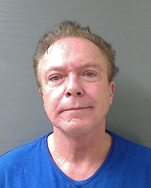 David Cassidy is seen in a police booking photo after his arrest on charges of felony DWI, driving while intoxicated, on August 21, 2013, in Schodack, New York. | Source: Schodack Police Department/Getty Images
