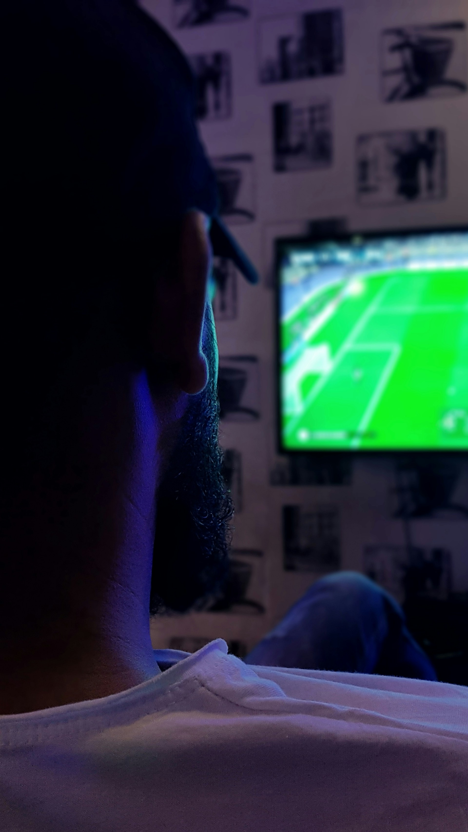 Man watching sports on television | Source: Unsplash