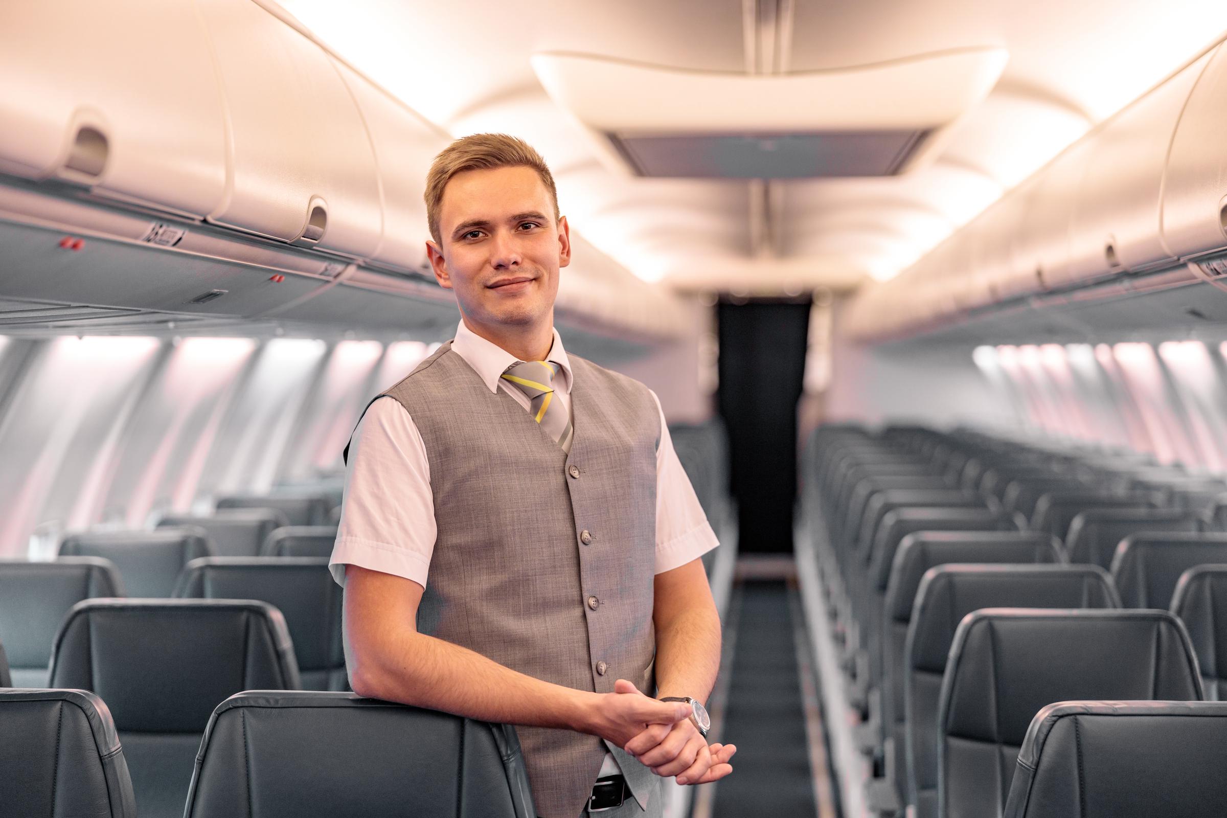 Male flight attendant | Source: Shutterstock