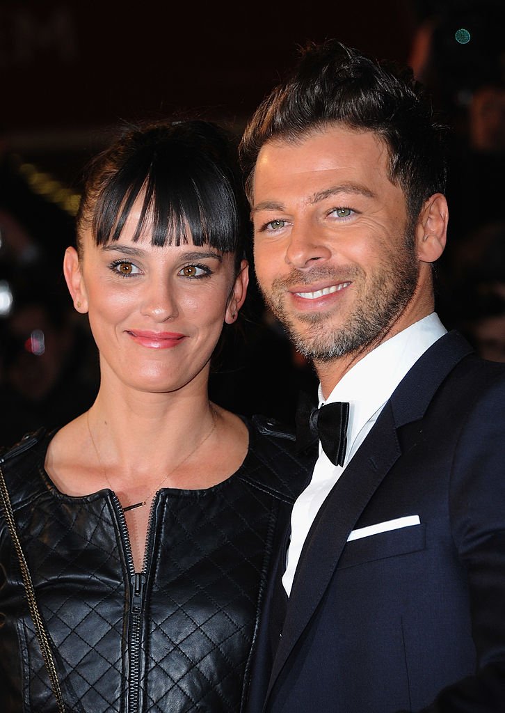 Christophe Maé et Nadège Sarron assistent aux NRJ Music Awards 2011 le 22 janvier 2011 au Palais des Festivals et des Congrès à Cannes. | Photo : Getty Images