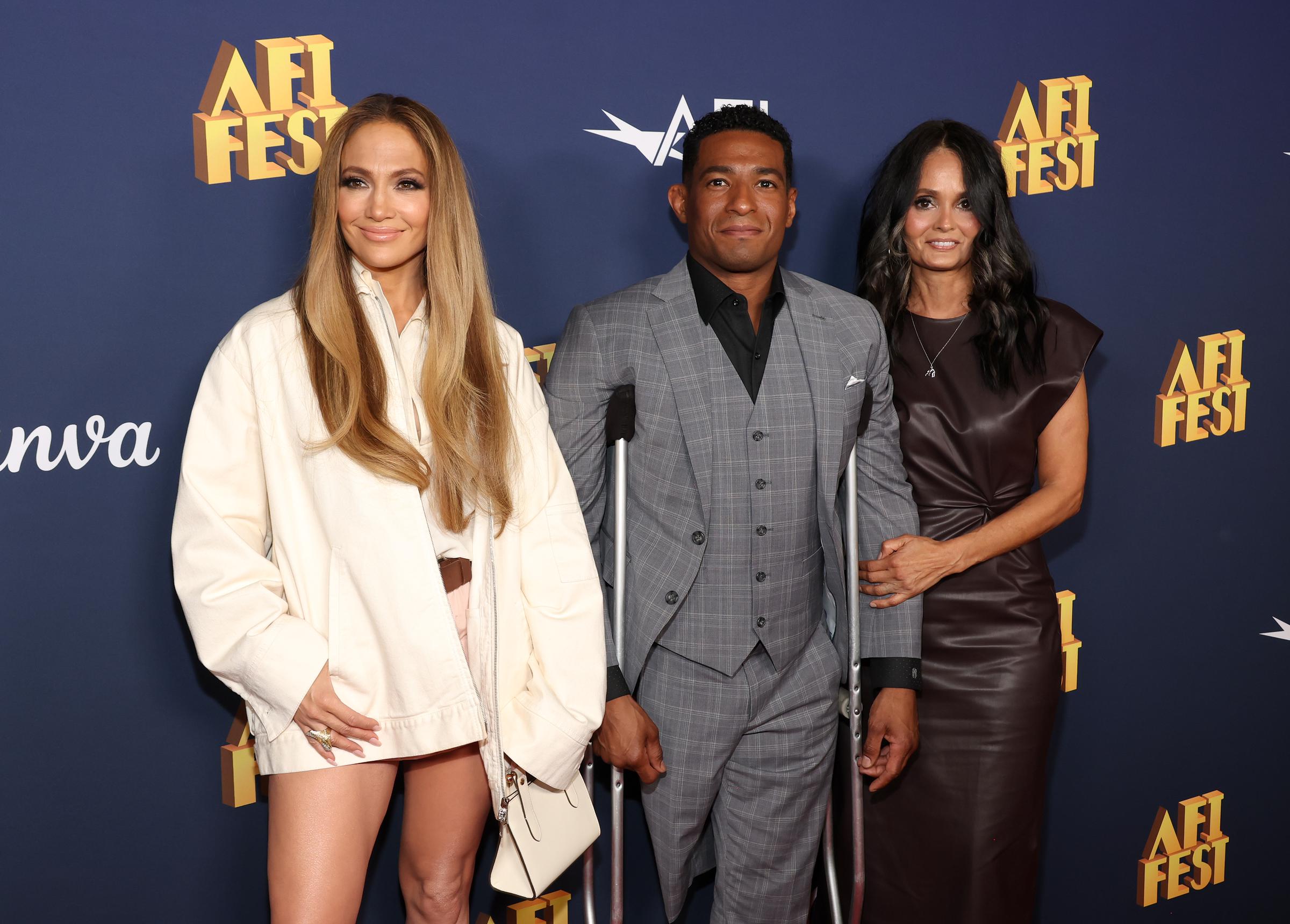 Jennifer Lopez, Anthony and Judy Robles. | Source: Getty Images