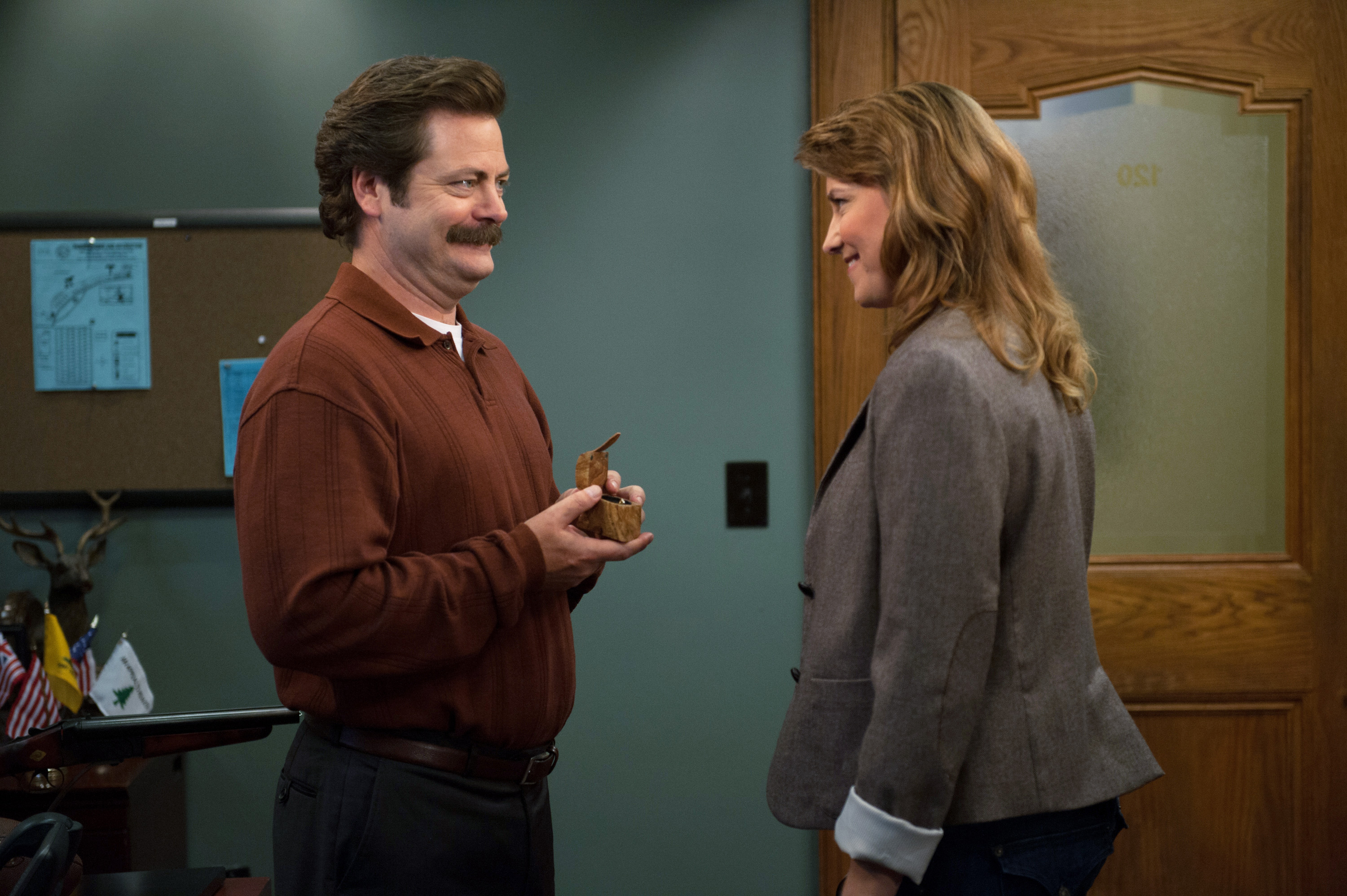 Nick Offerman as Ron Swanson, Lucy Lawless as Diane Lewis in "Parks and Recreation" on August 06, 2013 | Source: Getty Images