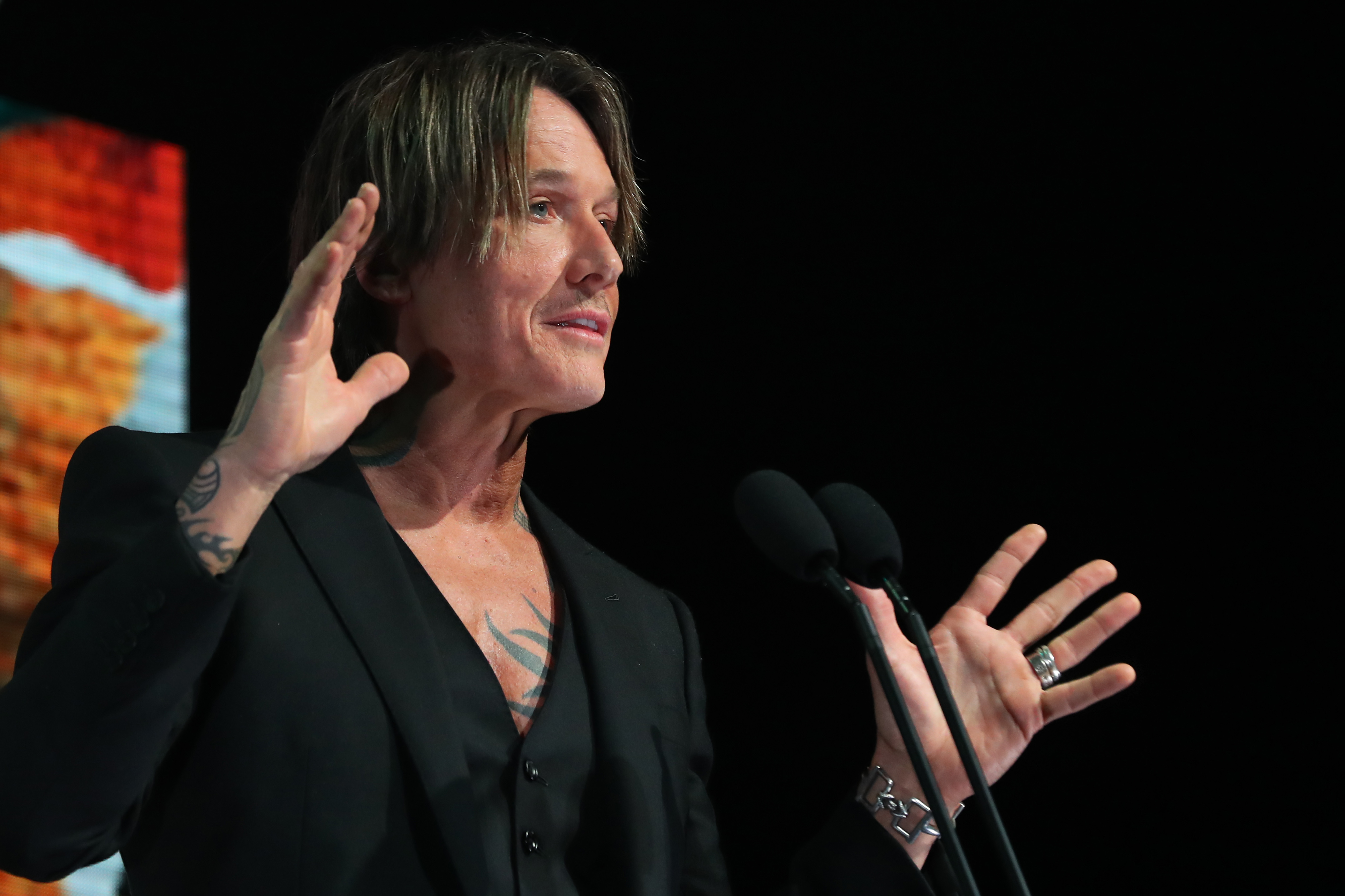 Urban speaks at the Golden Guitar Awards in Australia in January 2025. The appearance shows him in another music-focused setting, which sources later described as where he felt most comfortable.  | Source: Getty Images
