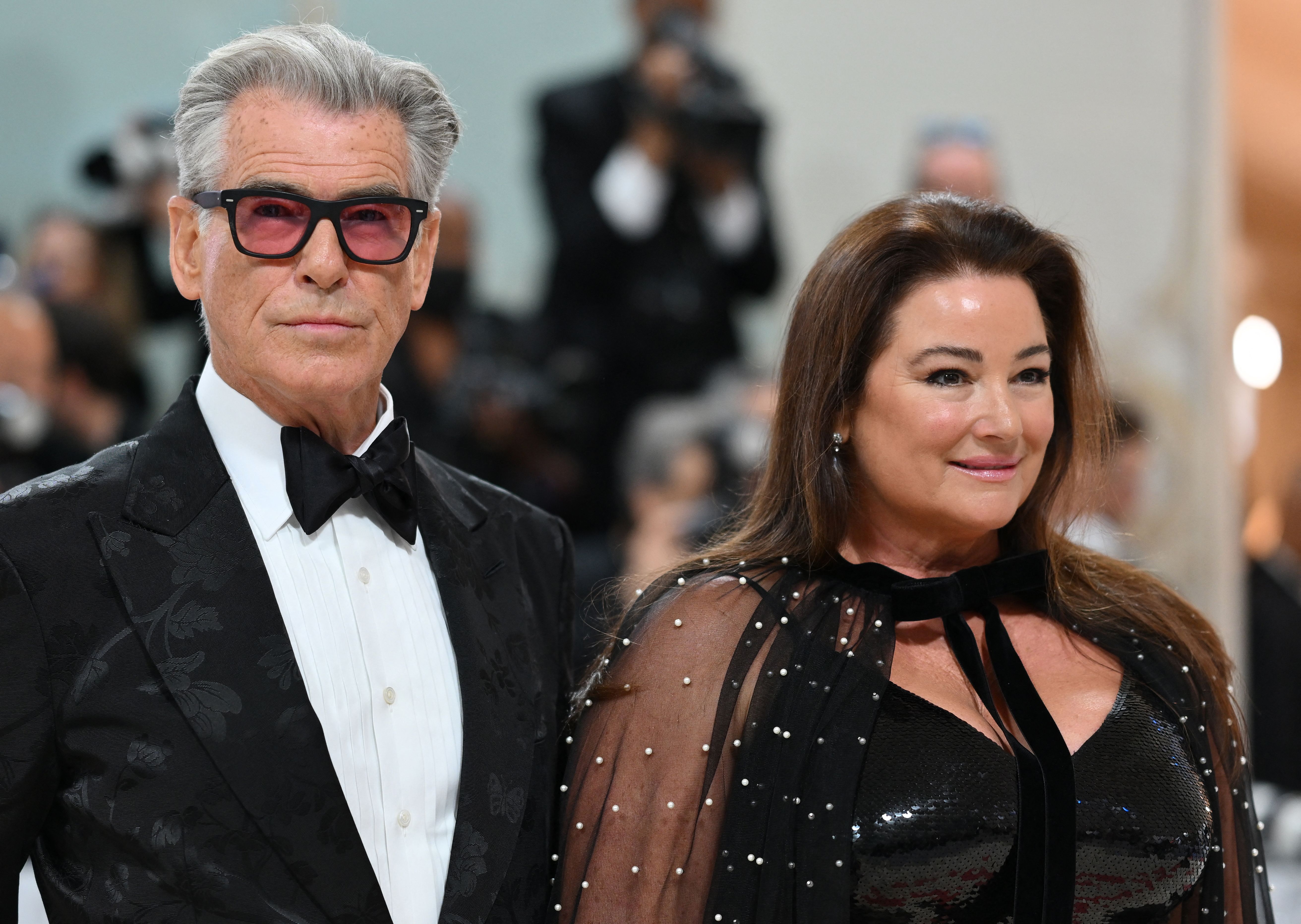 Pierce Brosnan and Keely Shaye Smith arrive for the 2023 Met Gala at the Metropolitan Museum of Art on May 1, 2023, in New York. | Source: Getty Images