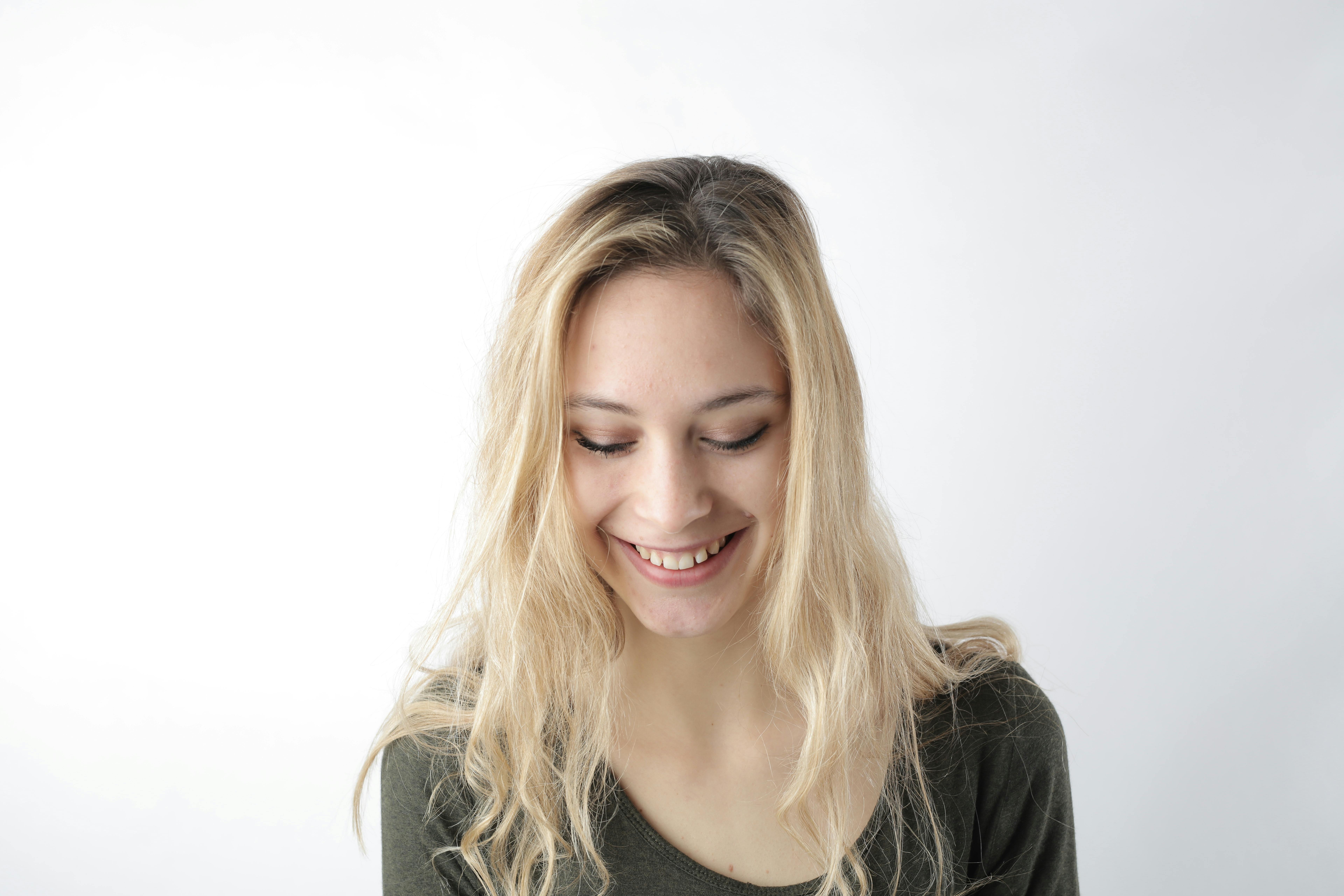 Portrait photo of a woman smiling | Source: Pexels
