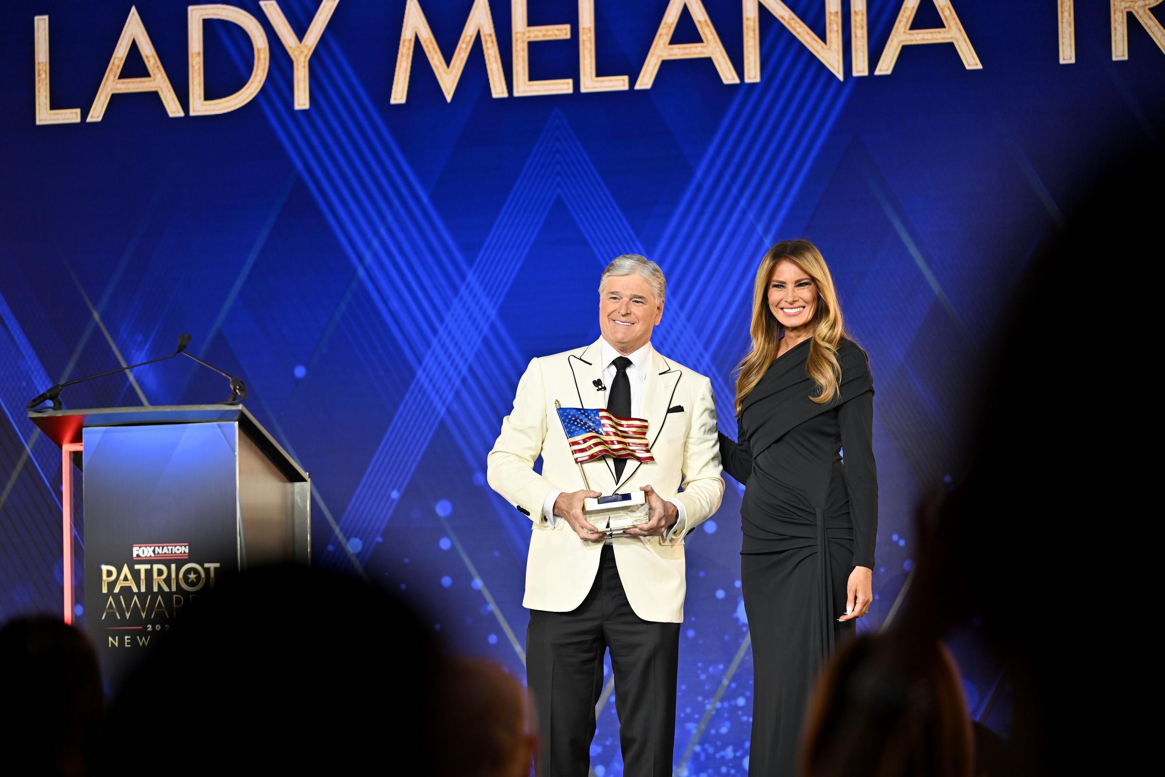 Melania Trump accepts the Patriot of the Year Award from Sean Hannity onstage during the 2025 Fox Nation Patriot Awards in Greenvale, New York | Source: Getty Images