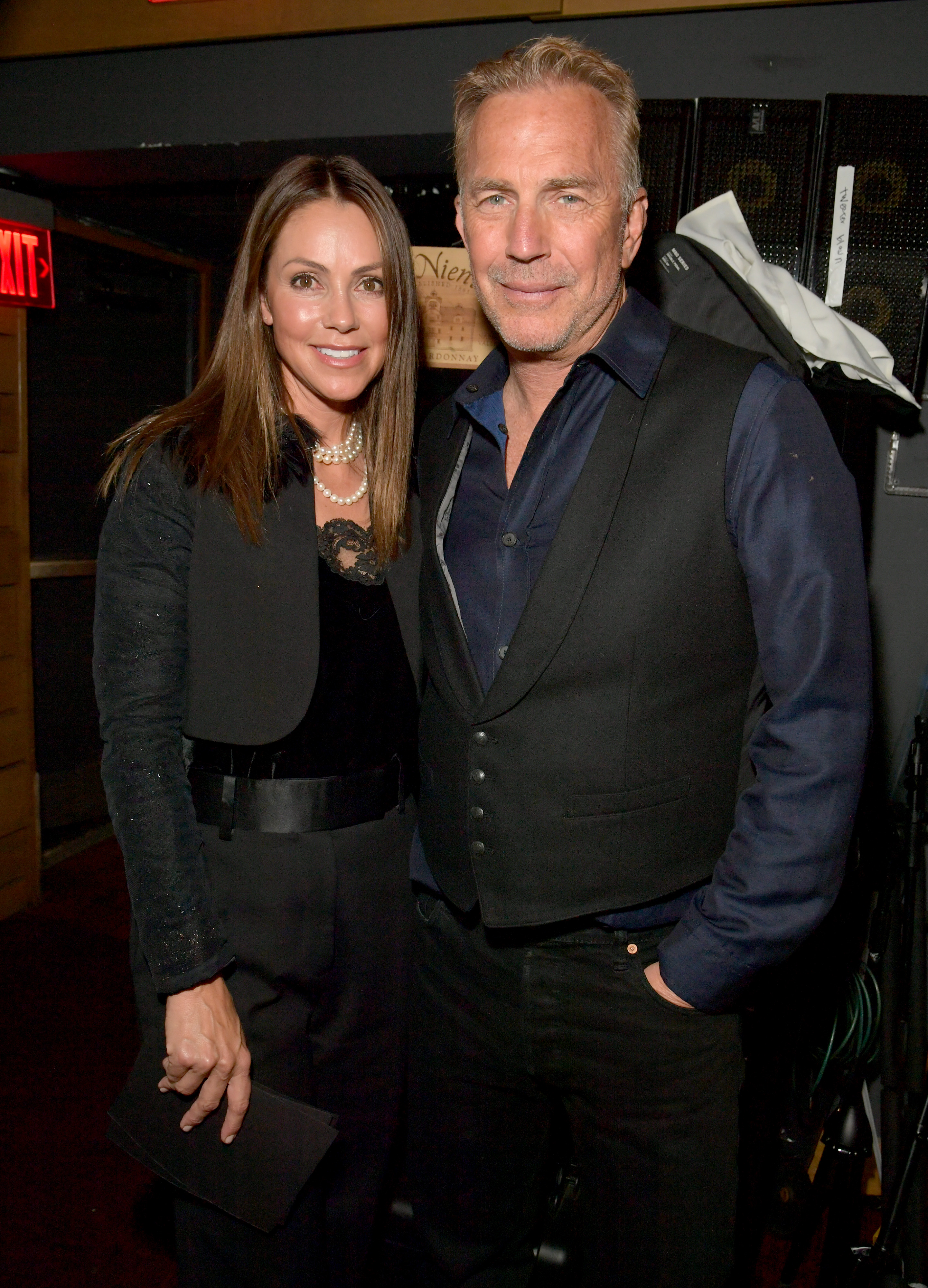 Christine Baumgartner and Kevin Costner at the OmniPeace Foundation Presents Rock Rwanda Benefit in Los Angeles, 2022 | Source: Getty Images