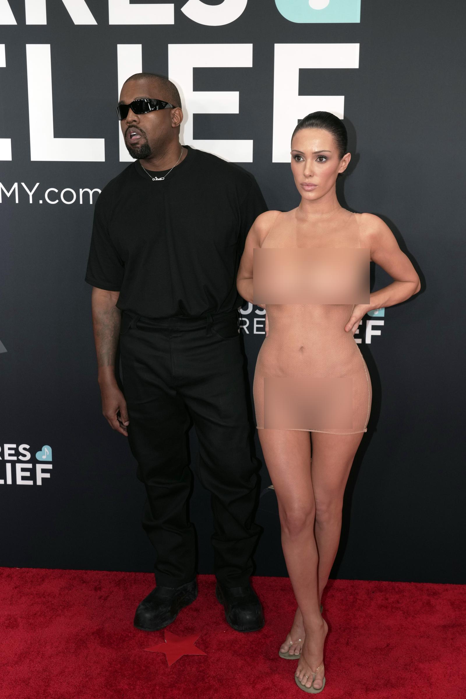 Kanye West and Bianca Censori (whose outfit has been blurred) attend the 67th GRAMMY Awards on February 2, 2025, in Los Angeles, California | Source: Getty Images