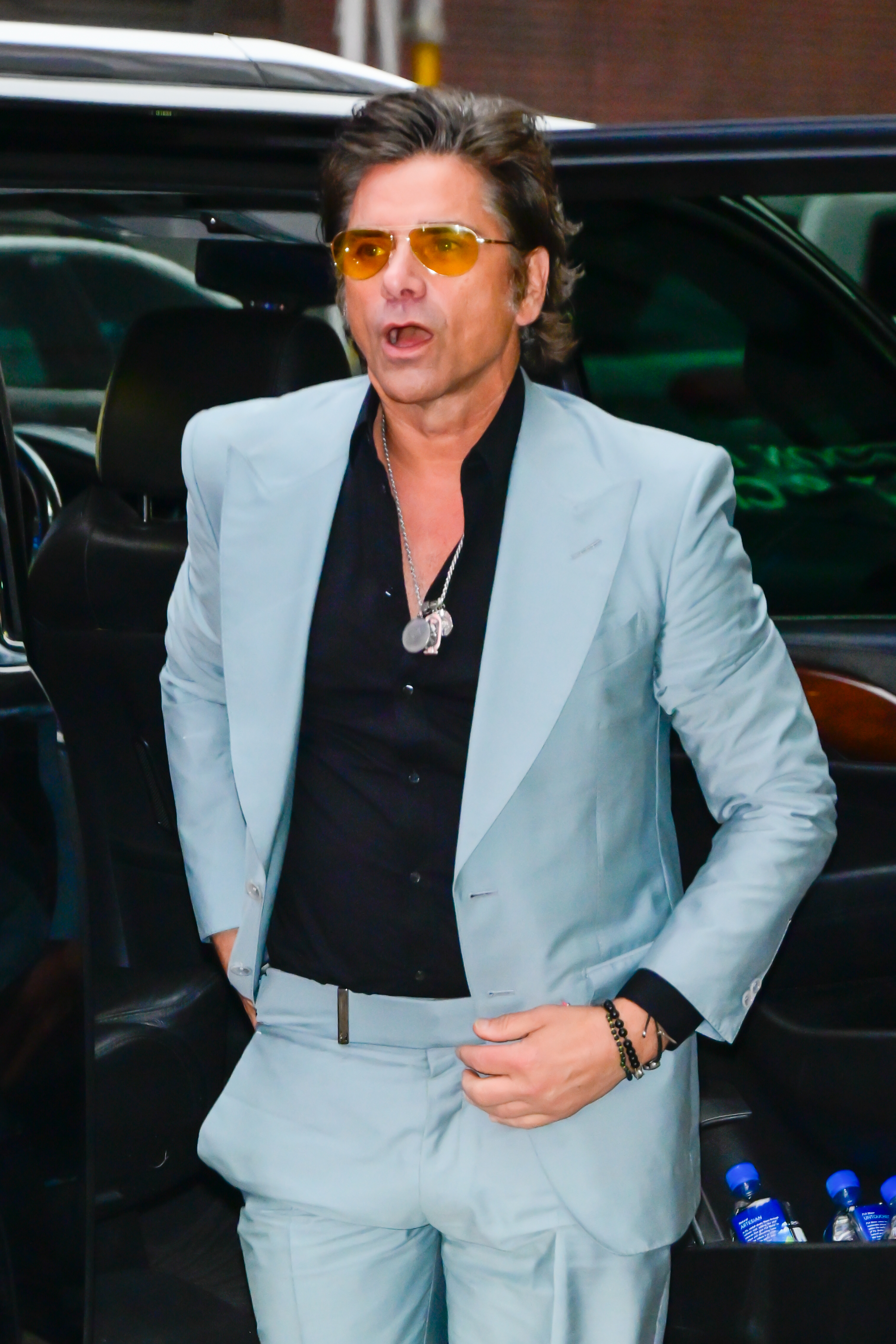 John Stamos spotted outside "Good Morning America" in New York City on July 17, 2024 | Source: Getty Images