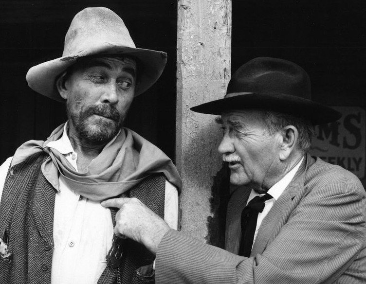 Ken Curtis (Festus Hagen) and Milburn Stone (Doc Adams) from the television program "Gunsmoke.," July 19, 1974. | Source: Wikimedia Commons