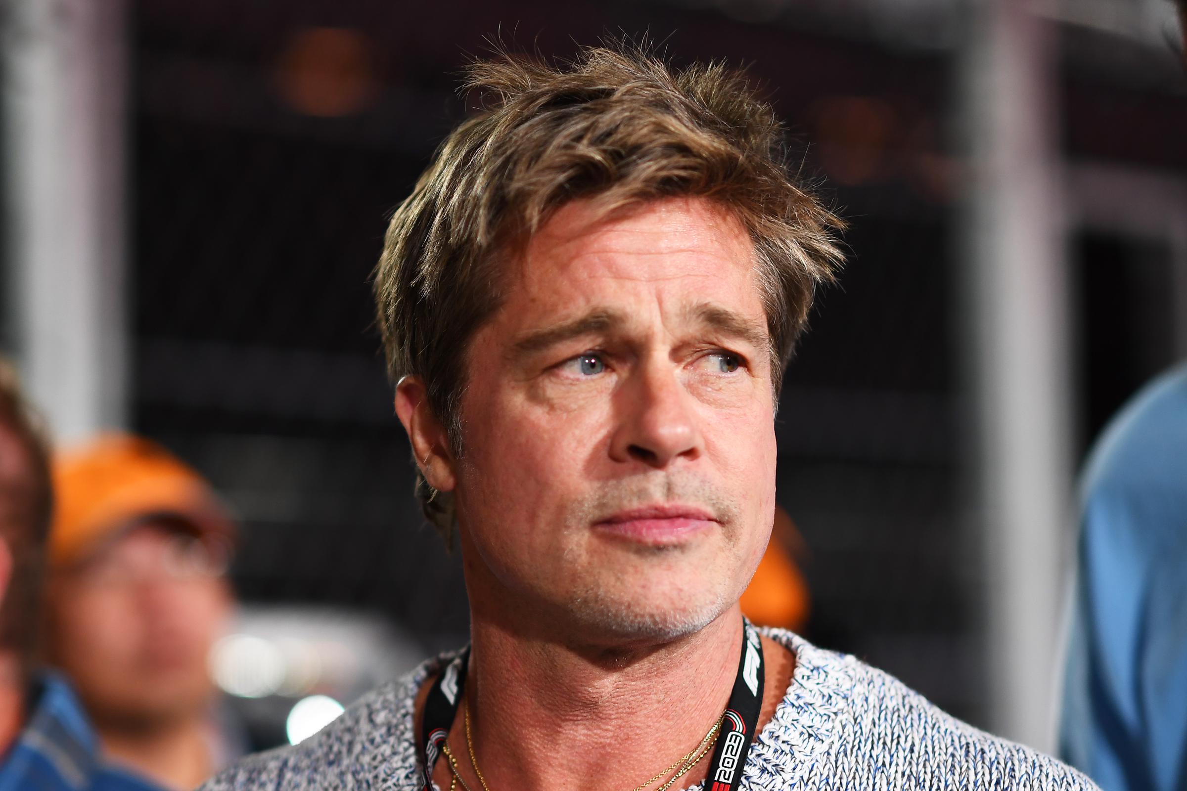 Brad Pitt photographed ahead of "Apex," his Formula One-based film, still commanding every room he walks into.