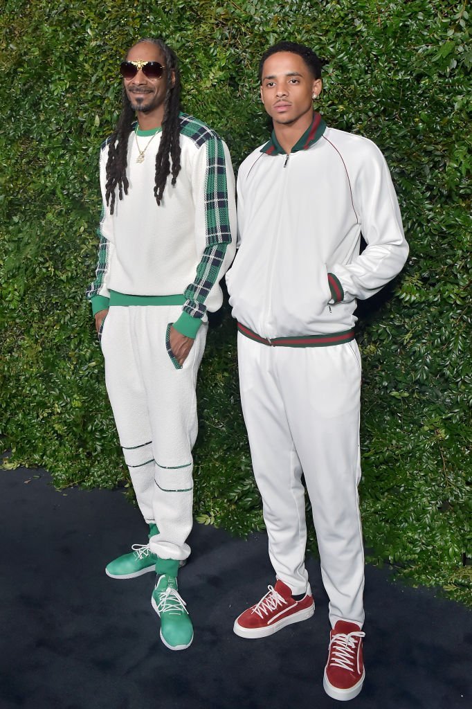 Snopp Dogg (L), wearing Chanel, and Cordell Broadus attend Chanel Dinner Celebrating our Majestic Oceans, A Benefit for NRDC at Private Residence | Photo: Getty Images