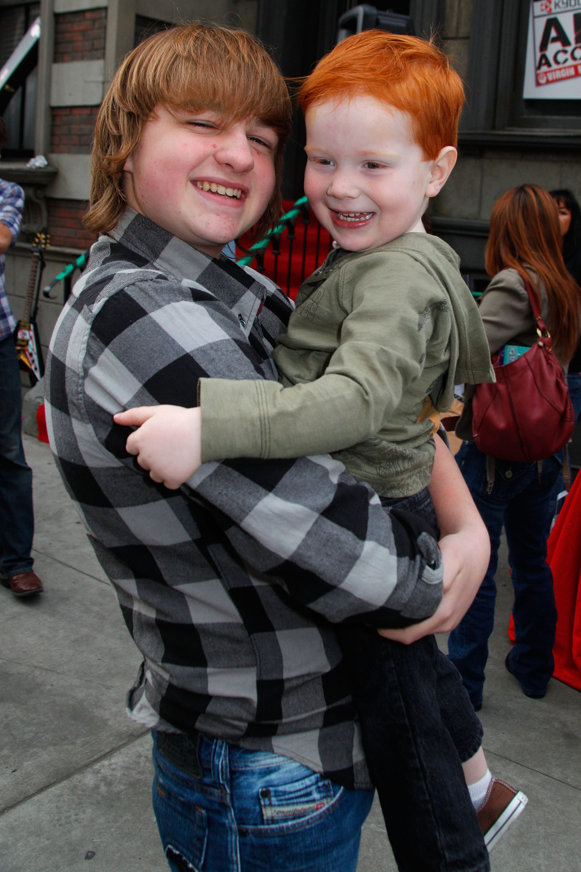 Angus T. Jones with his younger brother Otto Jones in Los Angeles in 2009 | Source: Getty Images