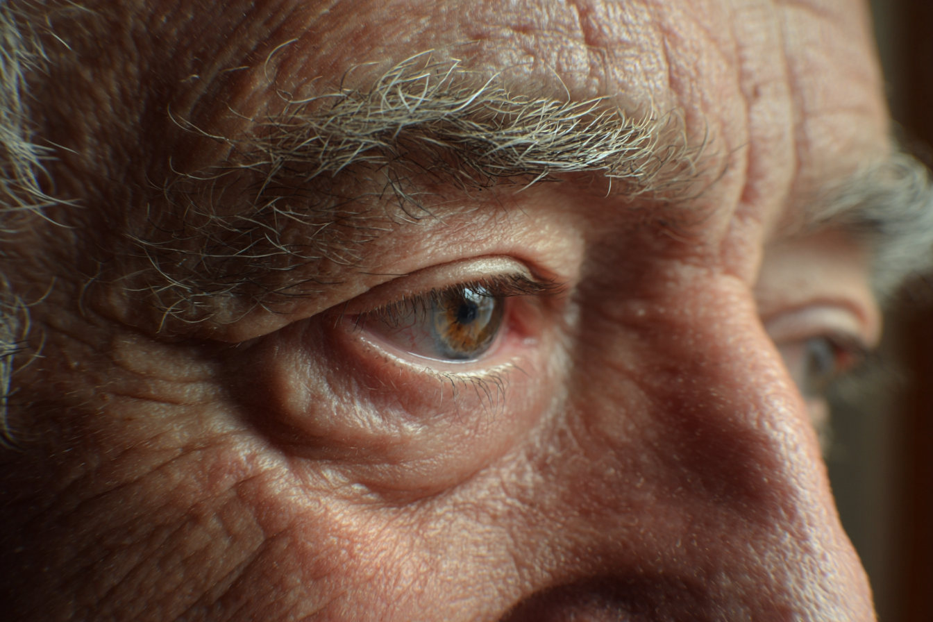 A close-up shot of an older man's eyes | Source: Midjourney