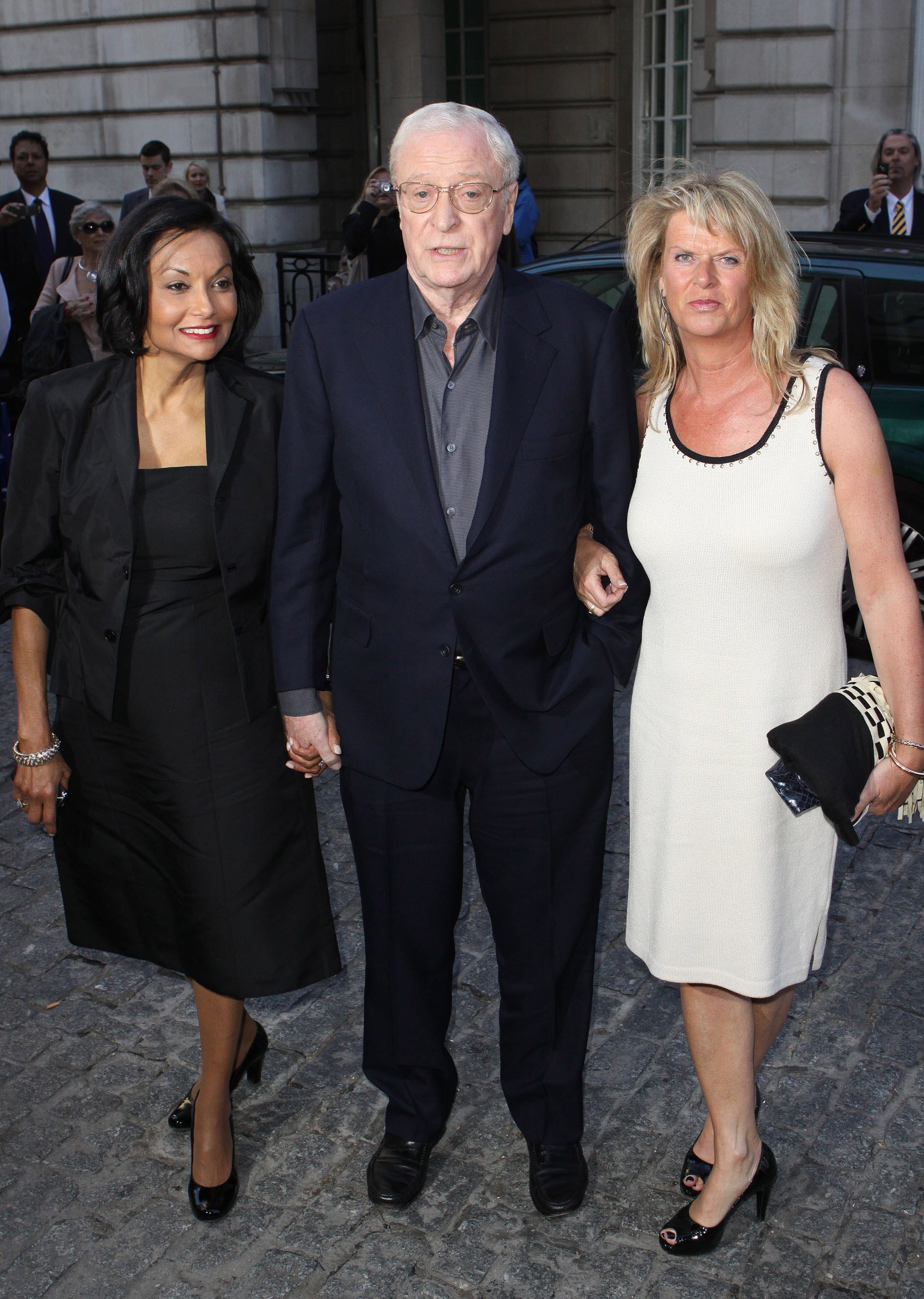 Michael Caine and Shakira Caine with daughter Dominique arriving at the London film premiere of "Is Anybody There?" at Curzon Mayfair on April 29, 2009 in London. / Source: Getty Images