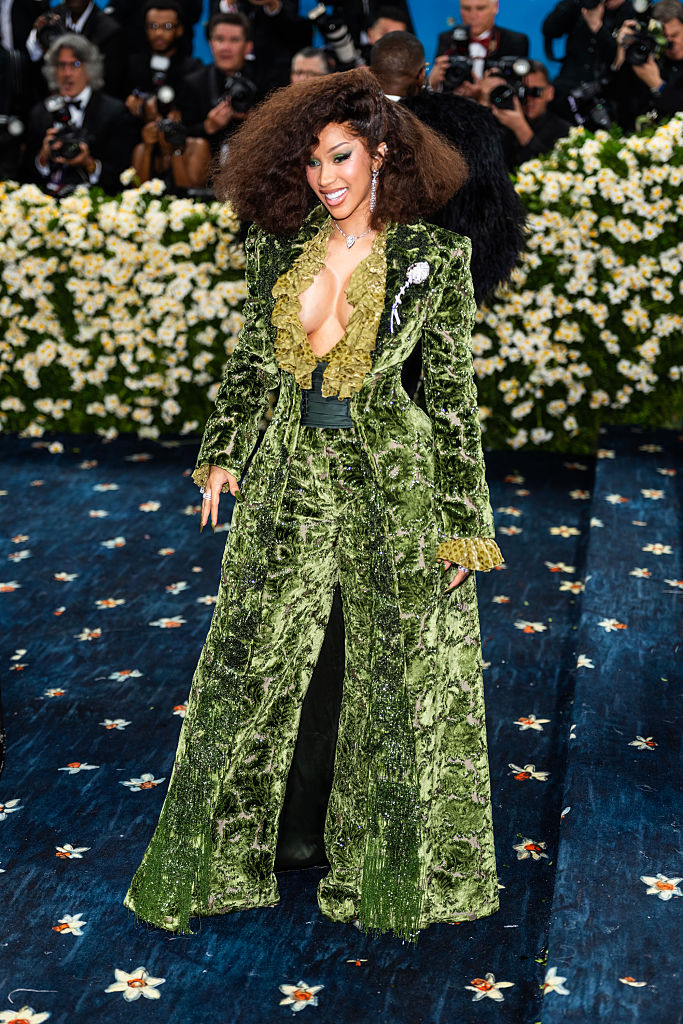 Cardi B turns heads at the 2025 Met Gala, held May 5 at the Met in NYC, which honored the theme "Superfine: Tailoring Black Style."