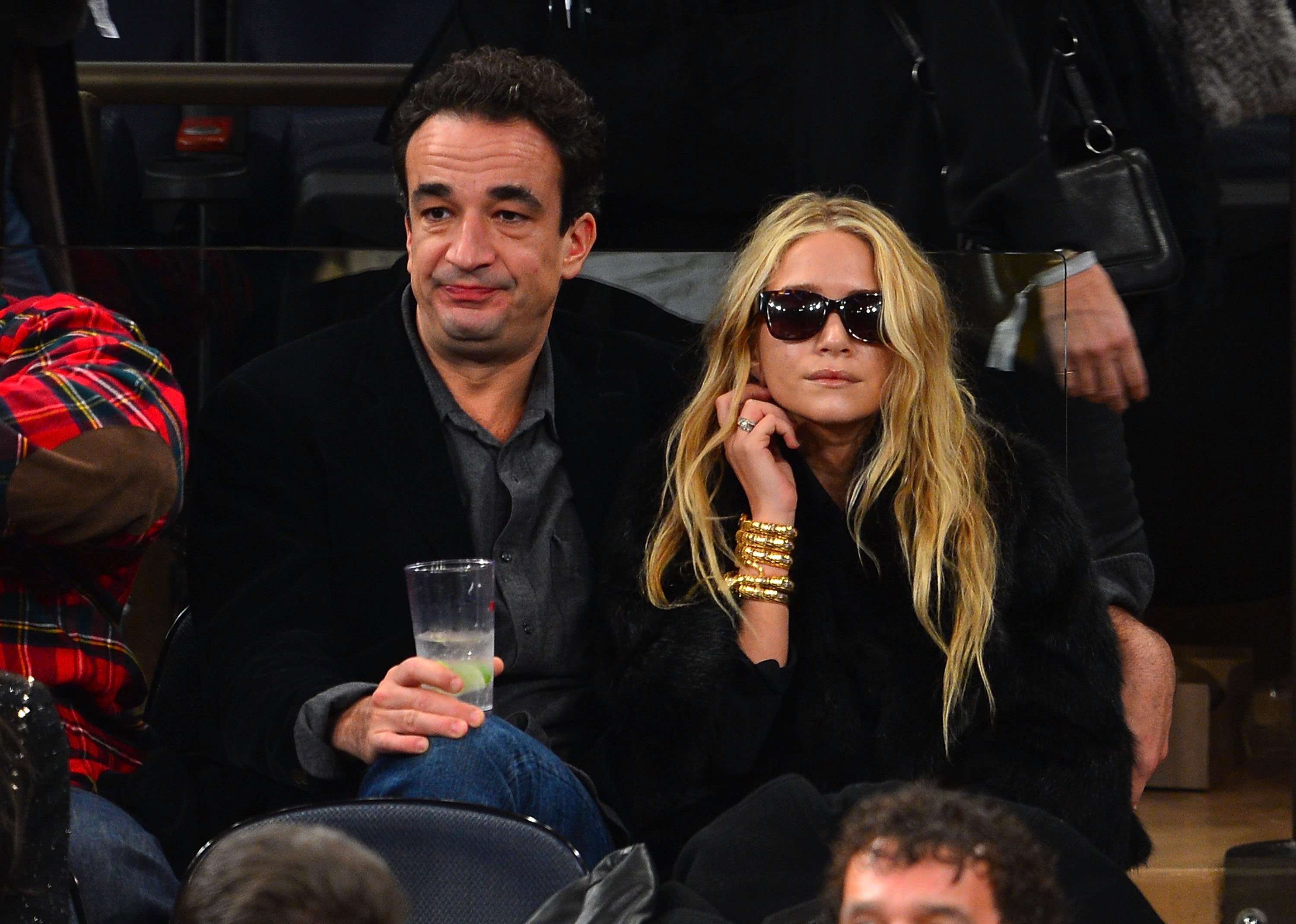 Olivier Sarkozy and Mary-Kate Olsen during the Cleveland Cavaliers vs New York Knicks game at Madison Square Garden on December 15, 2012 in New York City. / Source: Getty Images