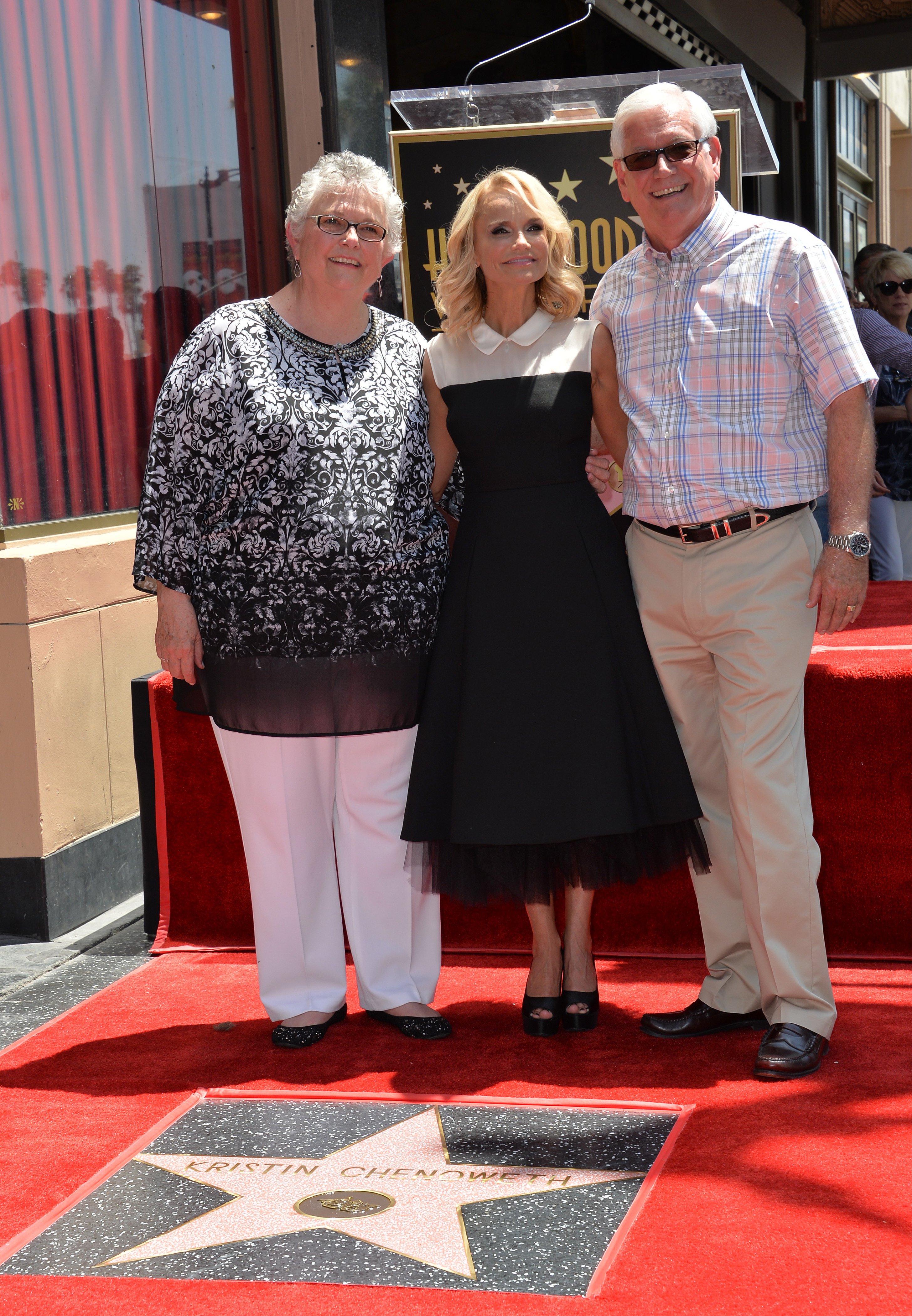 Junie, Kristin, and Jerry Chenoweth on Hollywood Blvd where the actress was honored with the 2,555th star on the Hollywood Walk of Fame in Los Angeles, California, on July 24, 2015. | Source: Featureflash Photo Agency/Shutterstock