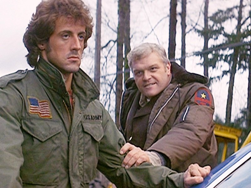 Sylvester Stallone as John Rambo, and Brian Dennehy as Sheriff Will Teasle in "First Blood" released in October 1982 | Photo: Getty Images