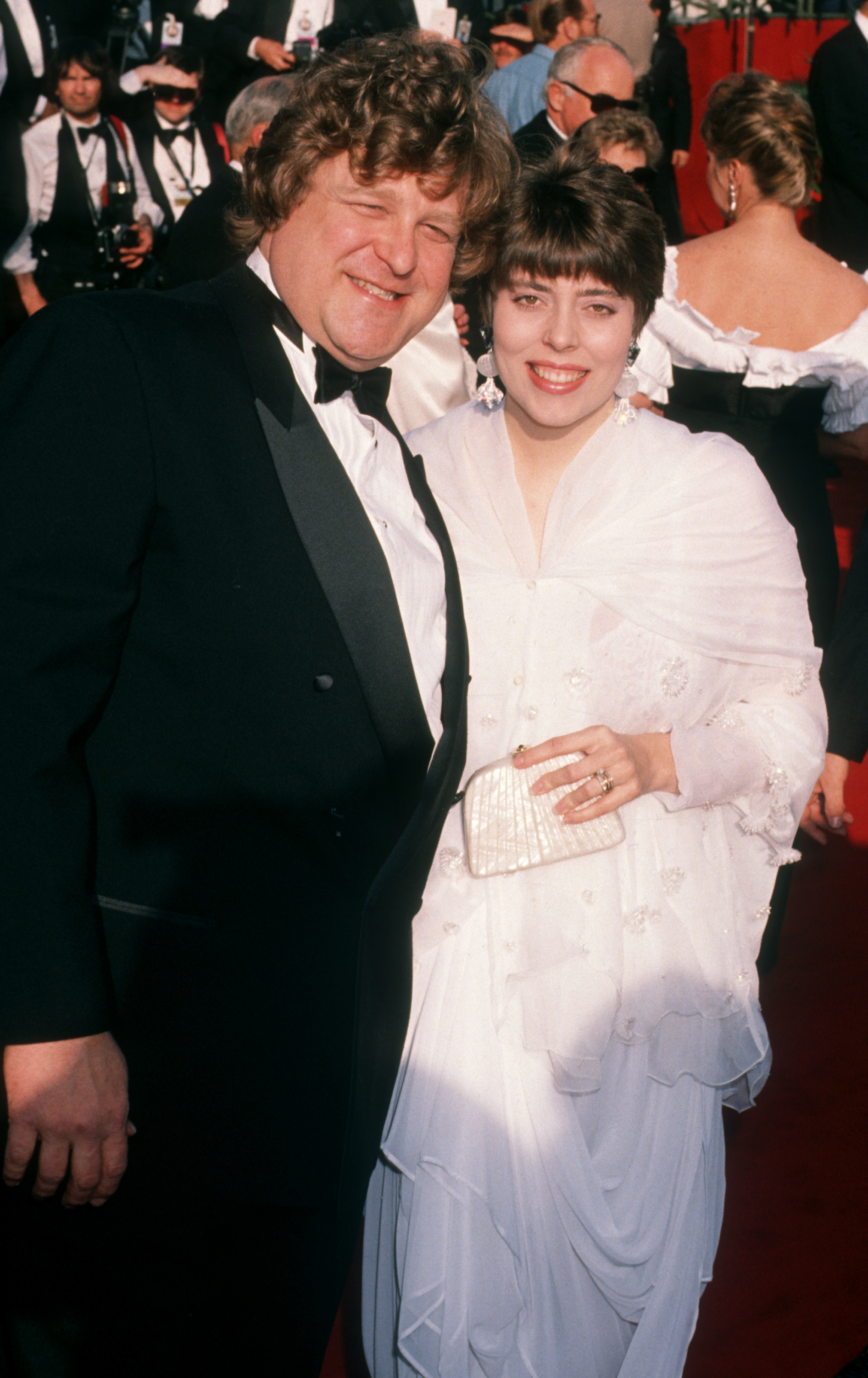 John Goodman and his wife Annabeth Hartzog attend the 62nd Annual Academy Awards on March 26, 1990, at the Dorothy Chandler Pavilion in Los Angeles, California. | Source: Getty Images