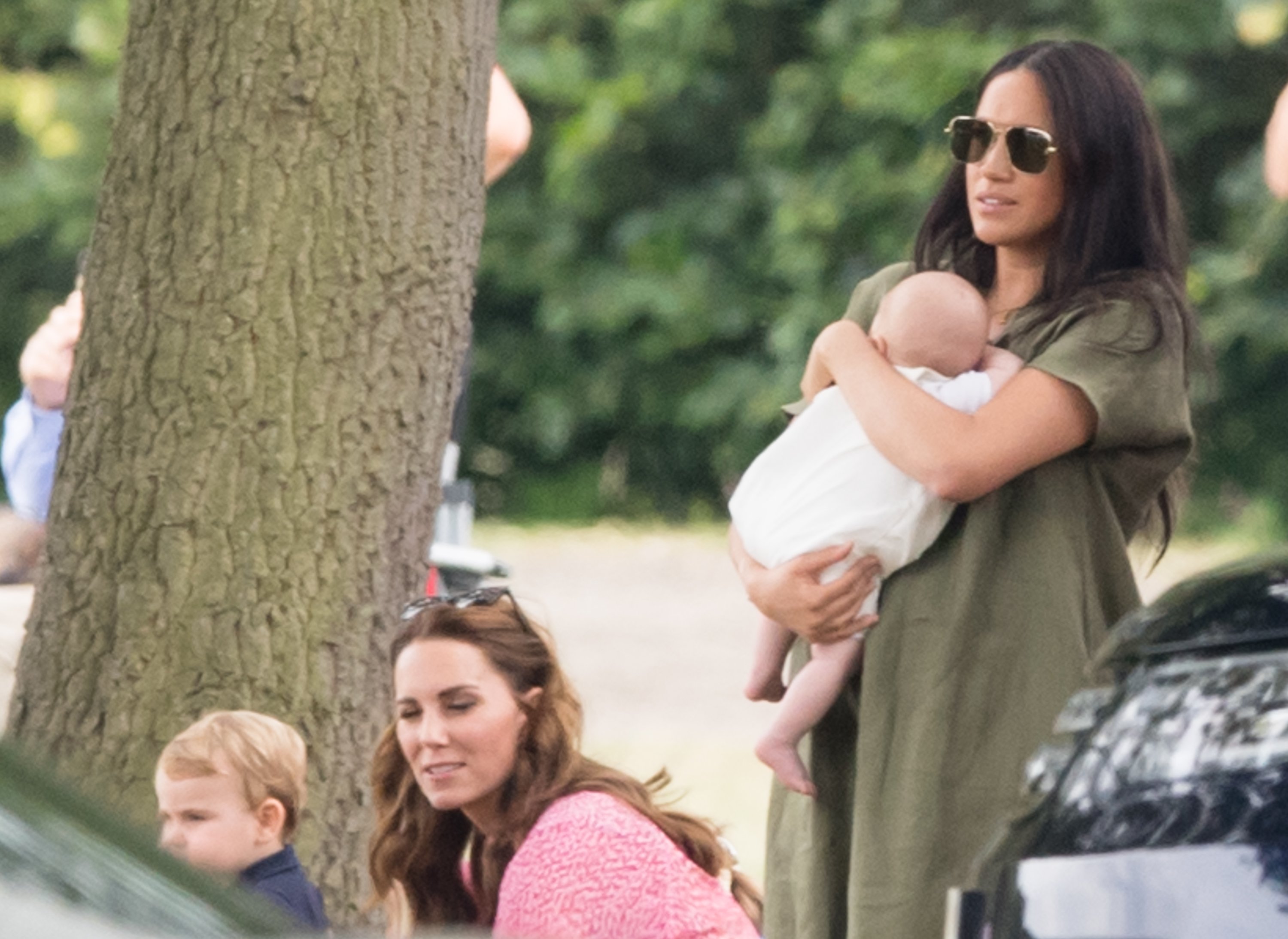 Meghan, Duchess of Sussex and Archie Harrison Mountbatten-Windsor, Catherine, Duchess of Cambridge and Prince Louis attend The King Power Royal Charity Polo Day at Billingbear Polo Club on July 10, 2019 in Wokingham, England | Source: Getty Images