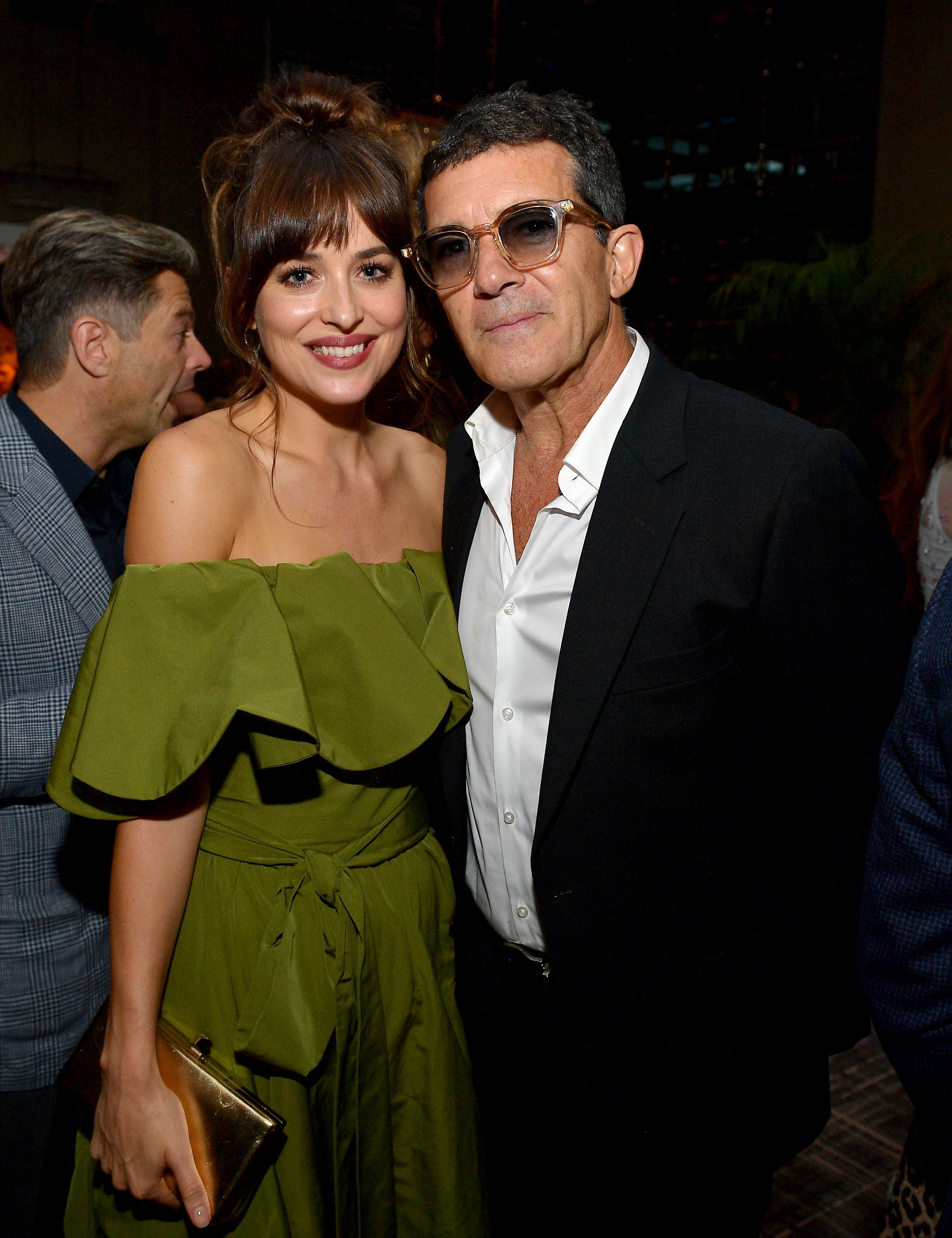 Dakota Johnson and Antonio Banderas at The Hollywood Foreign Press Association and The Hollywood Reporter party at the Toronto International Film Festival on September 7, 2019, in Toronto, Canada | Source: Getty Images