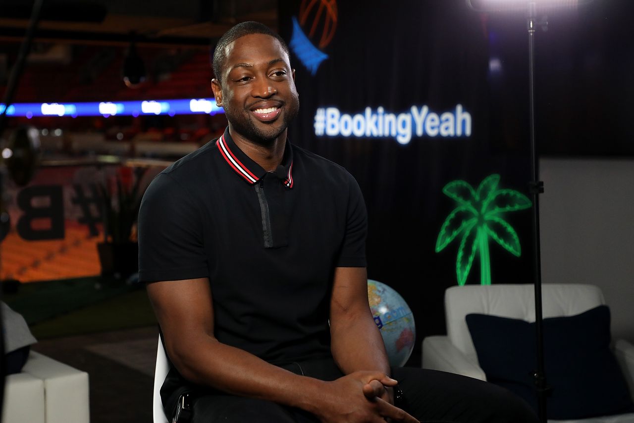 Booking.com kicks off Its "Book the U.S." list with Dwyane Wade on March 7, 2018. | Source: Getty Images