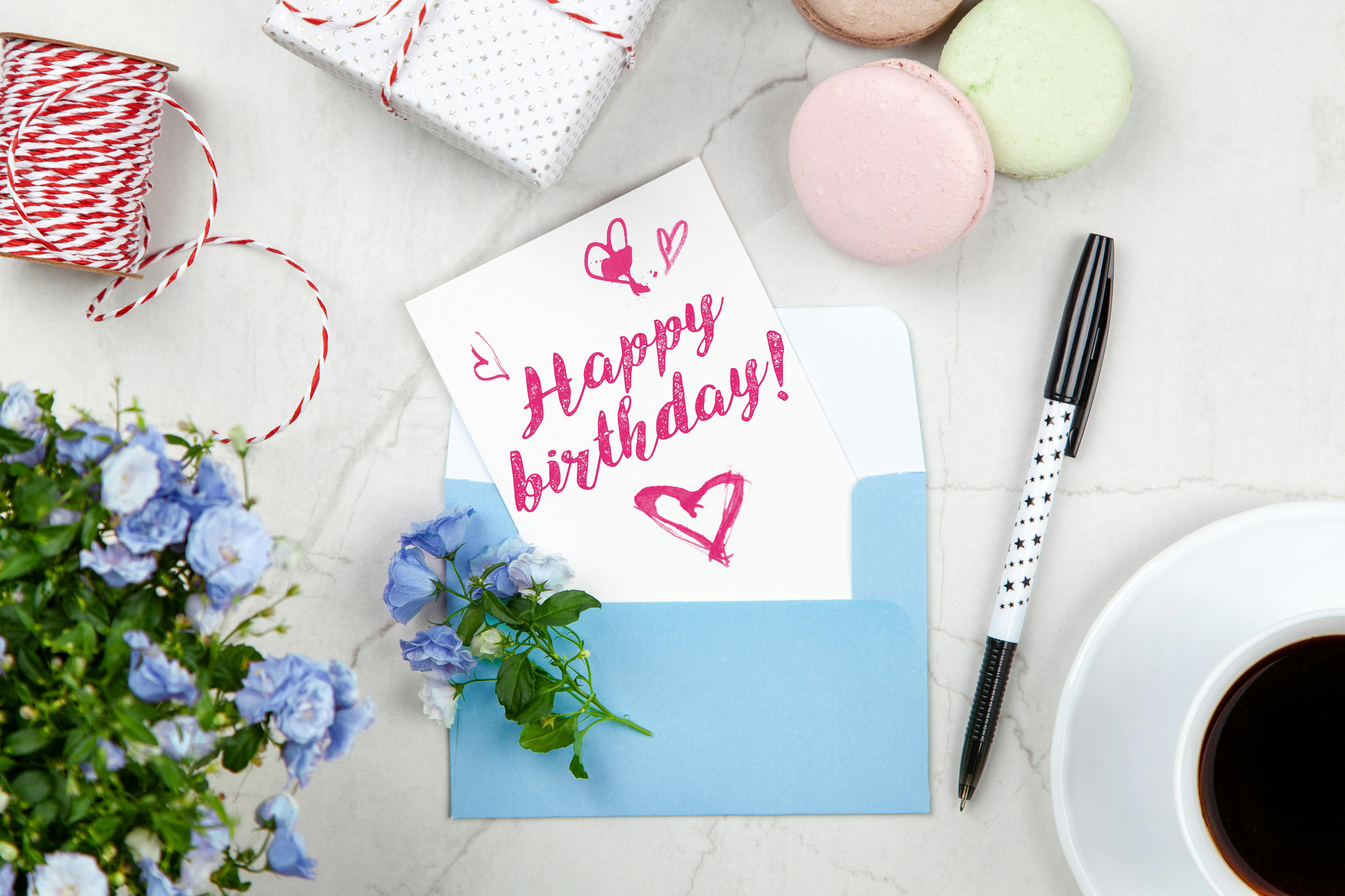 A birthday card and a pen | Source: Pexels