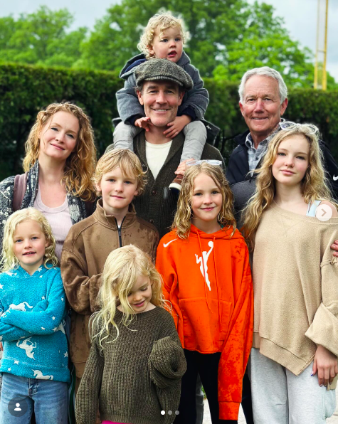 Kimberly and James Van Der Beek posing for a heartwarming family photo with their kids and another loved one, posted on June 16, 2024. | Source: Instagram/vanderjames