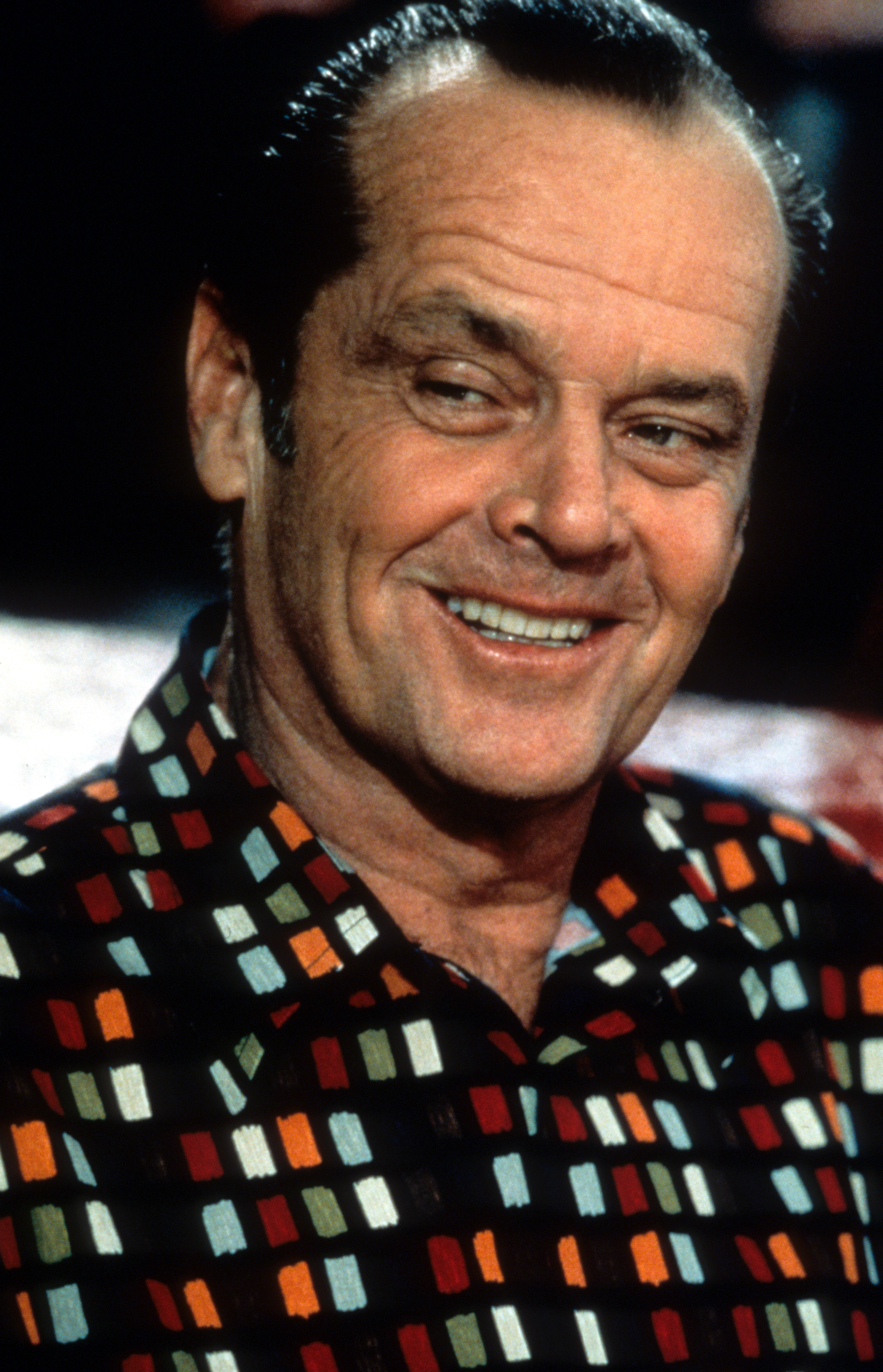 Nicholson, who was 61 in 1997, projected a completely different energy as he grinned mischievously in a scene from "As Good as It Gets." With his slicked-back hair, patterned shirt, and unmistakable smirk, he embodied a more classic, grounded kind of charisma — less polished, more unpredictable, and entirely his own.