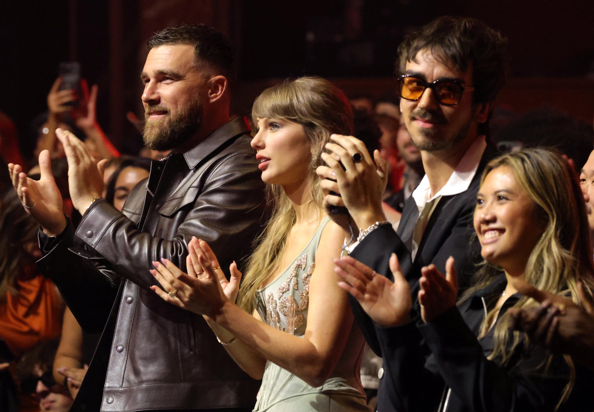 Travis Kelce, Taylor Swift and Bryce Glenn attend the 2026 iHeartRadio Music Awards | Source: Getty Images