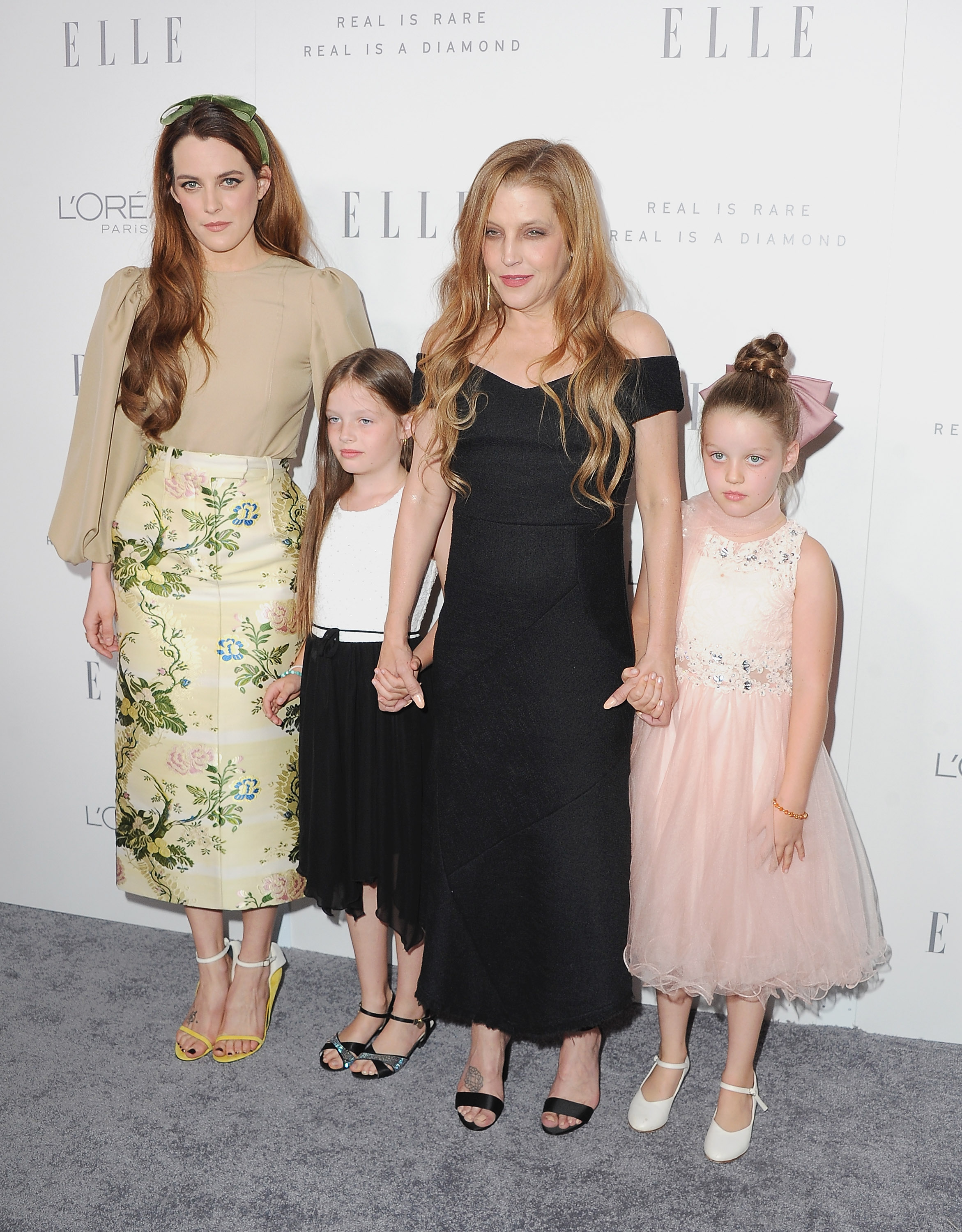 Lisa Marie Presley with her daughters, Riley, Harper, and Finley during ELLE's 24th Annual Women in Hollywood Celebration in Los Angeles, California on October 16, 2017 | Source: Getty Images