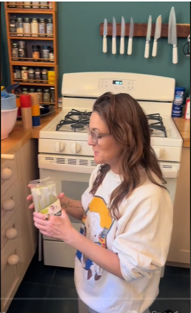 Drew Barrymore arranging her kitchen from a TikTok post dated April 16, 2024 | Source: Tiktok/@drewbarrymore