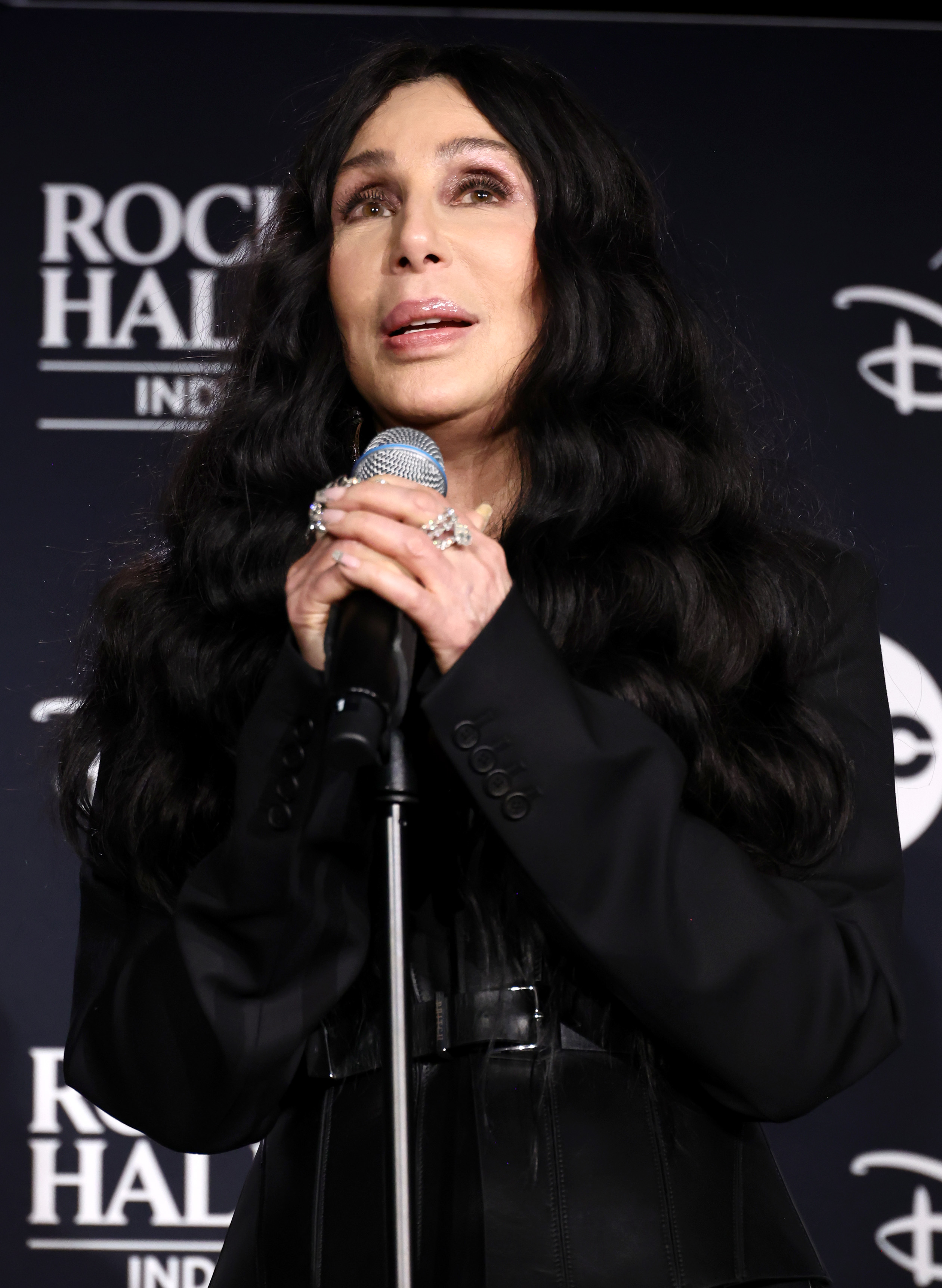 Cher speaks in the press room during the Rock & Roll Hall Of Fame Induction Ceremony on October 19, 2024, in Cleveland, Ohio | Source: Getty Images