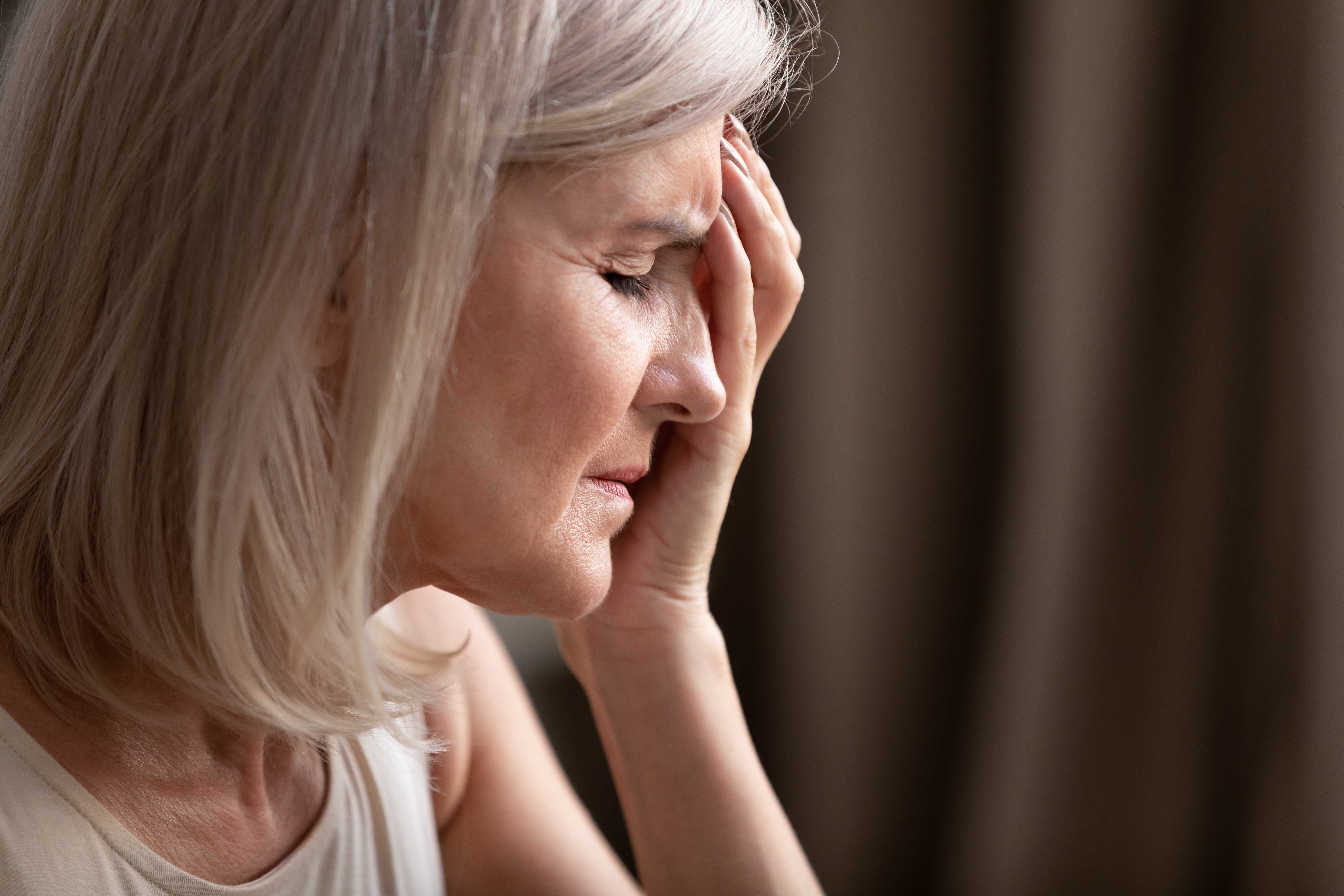 A dissapointed elderly woman | Source: Shutterstock