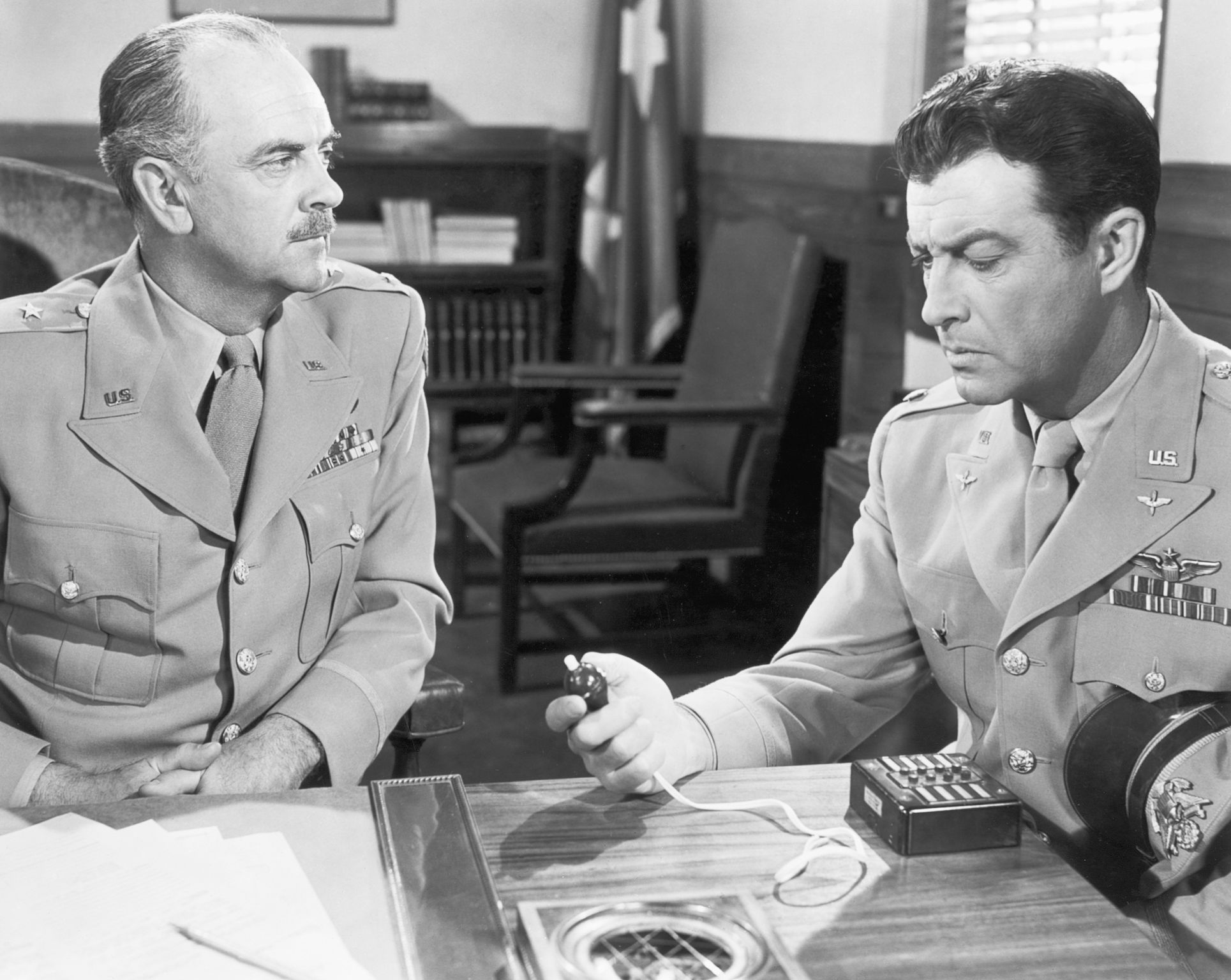 Larry Keating and Robert Taylor from a scene of the movie "Above And Beyond," circa 1950s. | Photo: Getty Images 