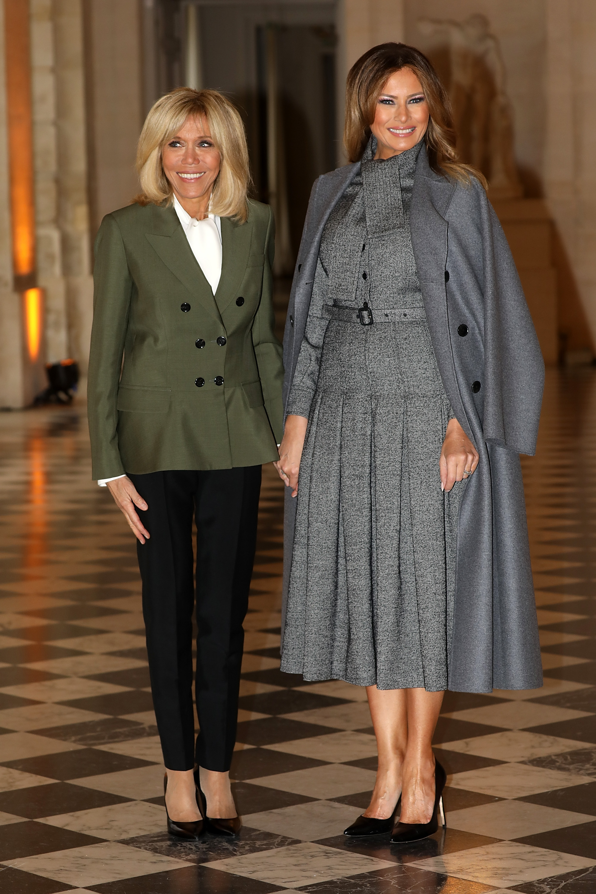 French first Lady Brigitte Macron and Melania Trump at the Head of States partner's Luncheon on November 11, 2018, in Versailles, France. | Source: Getty Images