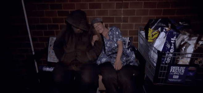 Suzan Lewis and a friend David sleeping on a metal bench in Philadelphia in 2017 | Photo: YouTube/Inside Edition