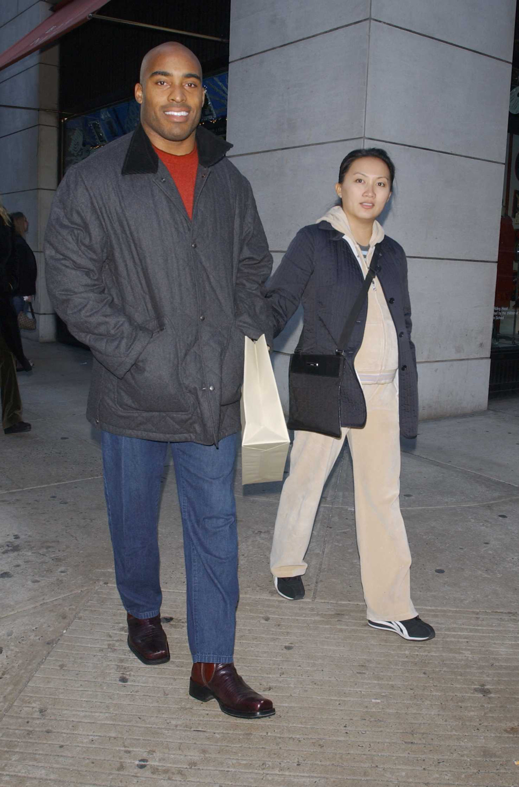 Tiki Barber and Ginny Cha are seen on December 29, 2003, in New York. | Source: Getty Images