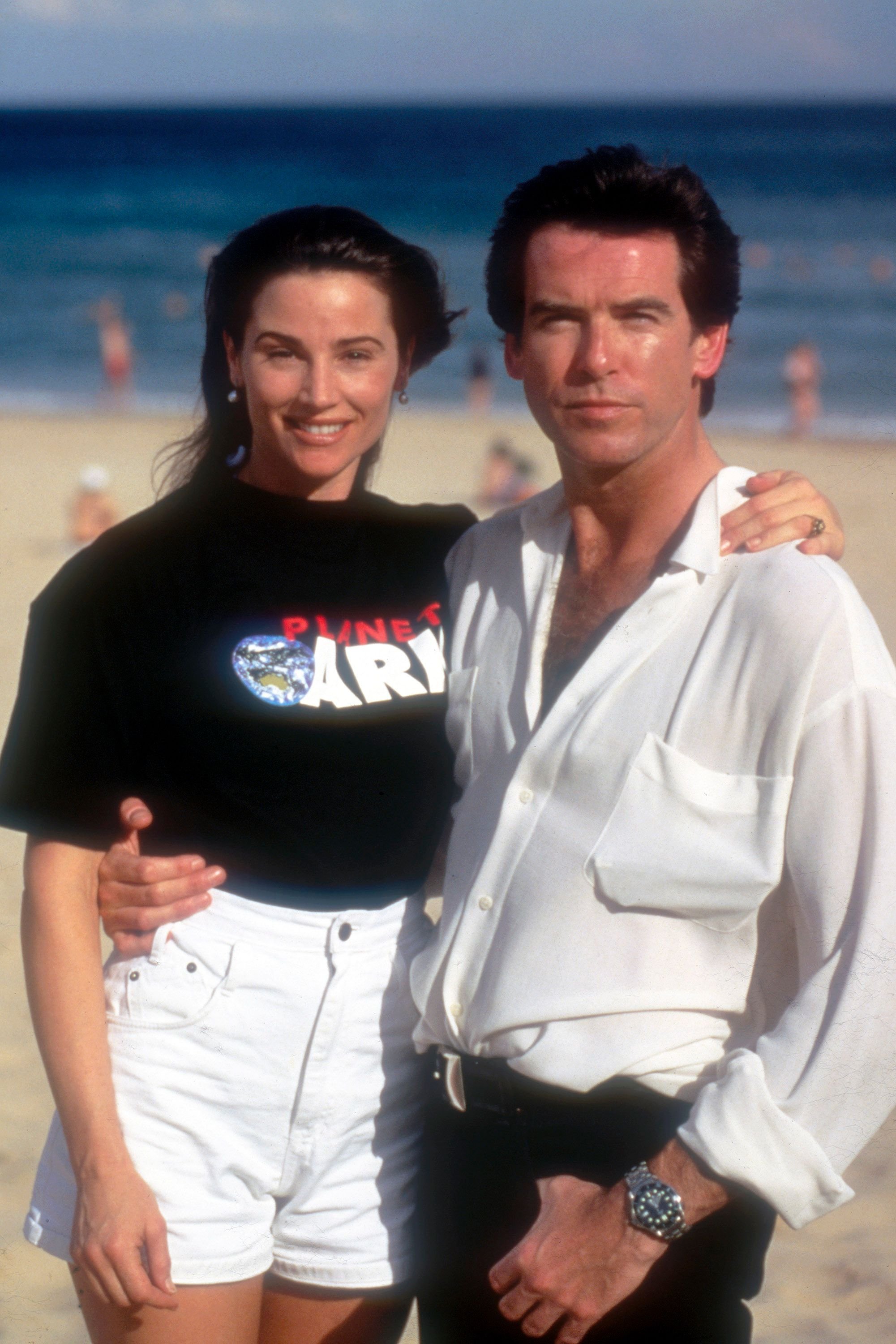 Irish actor Pierce Brosnan (R) with his girlfriend Keely Shaye Smith in Sydney for the premiere of his new James Bond film 'Goldeneye' in 1995 in Sydney, Australia. | Source: Getty Images