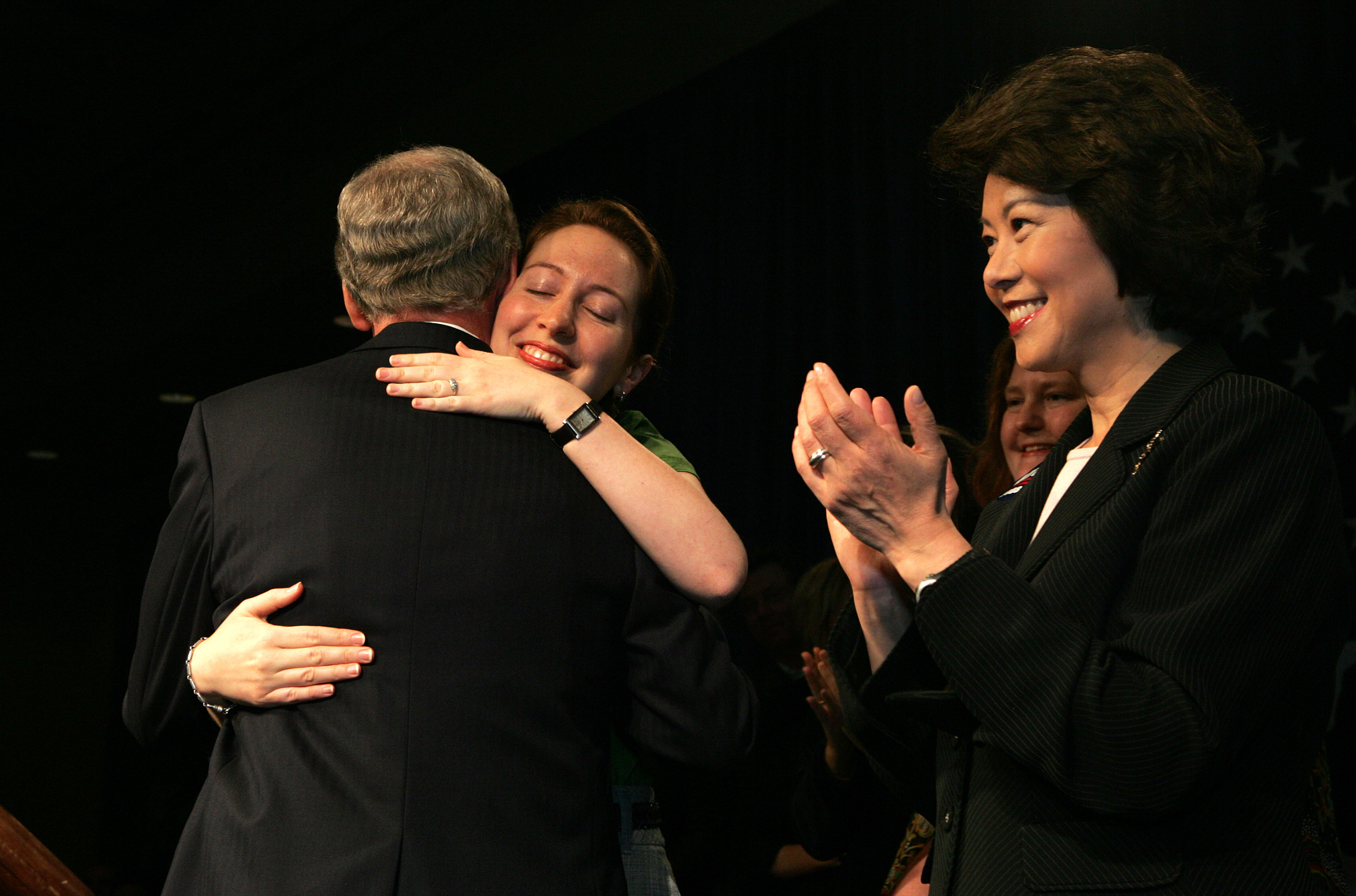 orter McConnell hugs her father while Elaine Chao applauds after his Senate election victory on November 4, 2008. During the senator's recent hospitalization, Chao issued a public statement, while Porter did not comment publicly. | Source: Getty Images