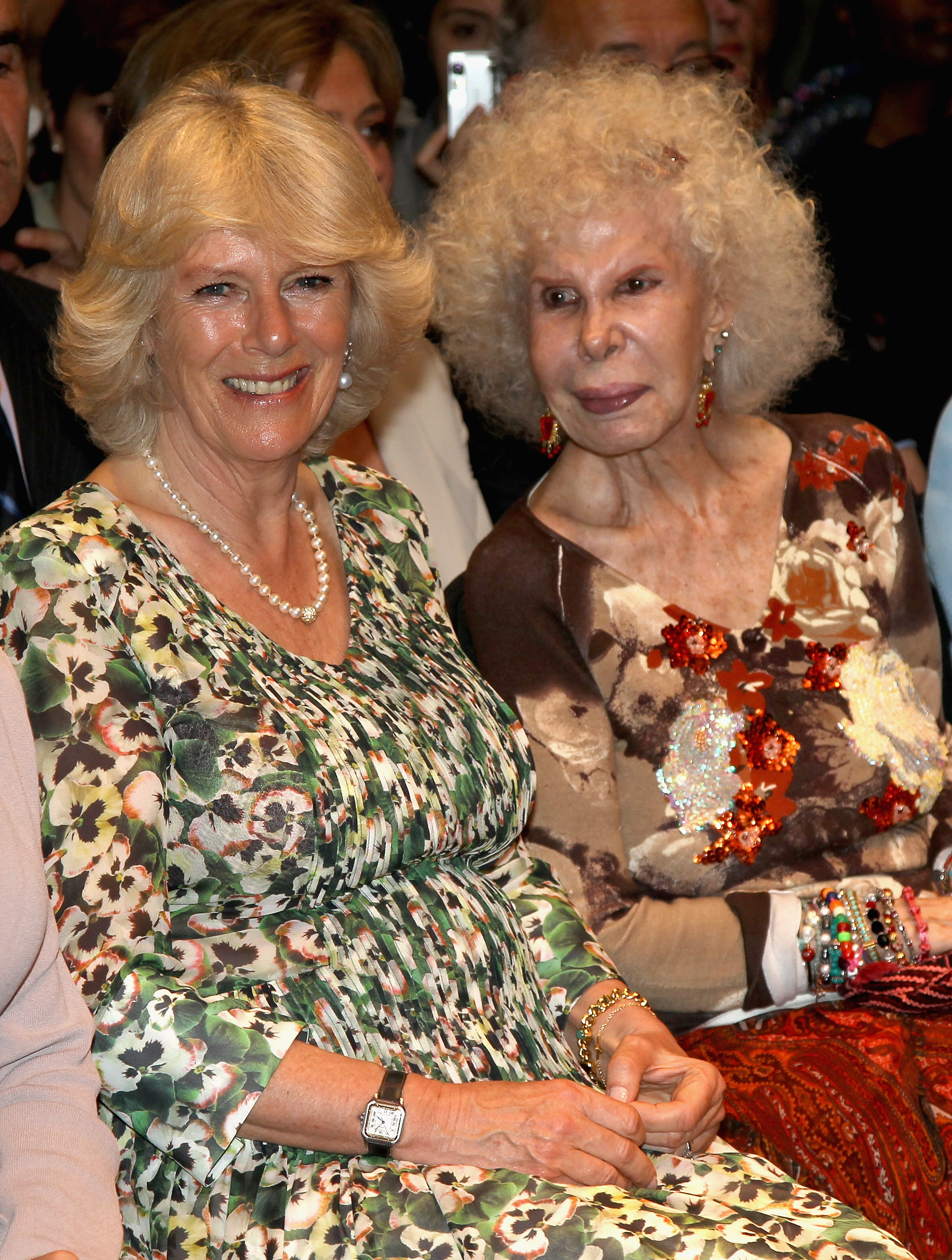 Queen Camilla Parker Bowls and the Duchess of Alba, Maria del Rosario Cayetana Fitz-James Stuart at the Flamenco Museum in Madrid, Spain on April 1, 2011 | Source: Getty Images