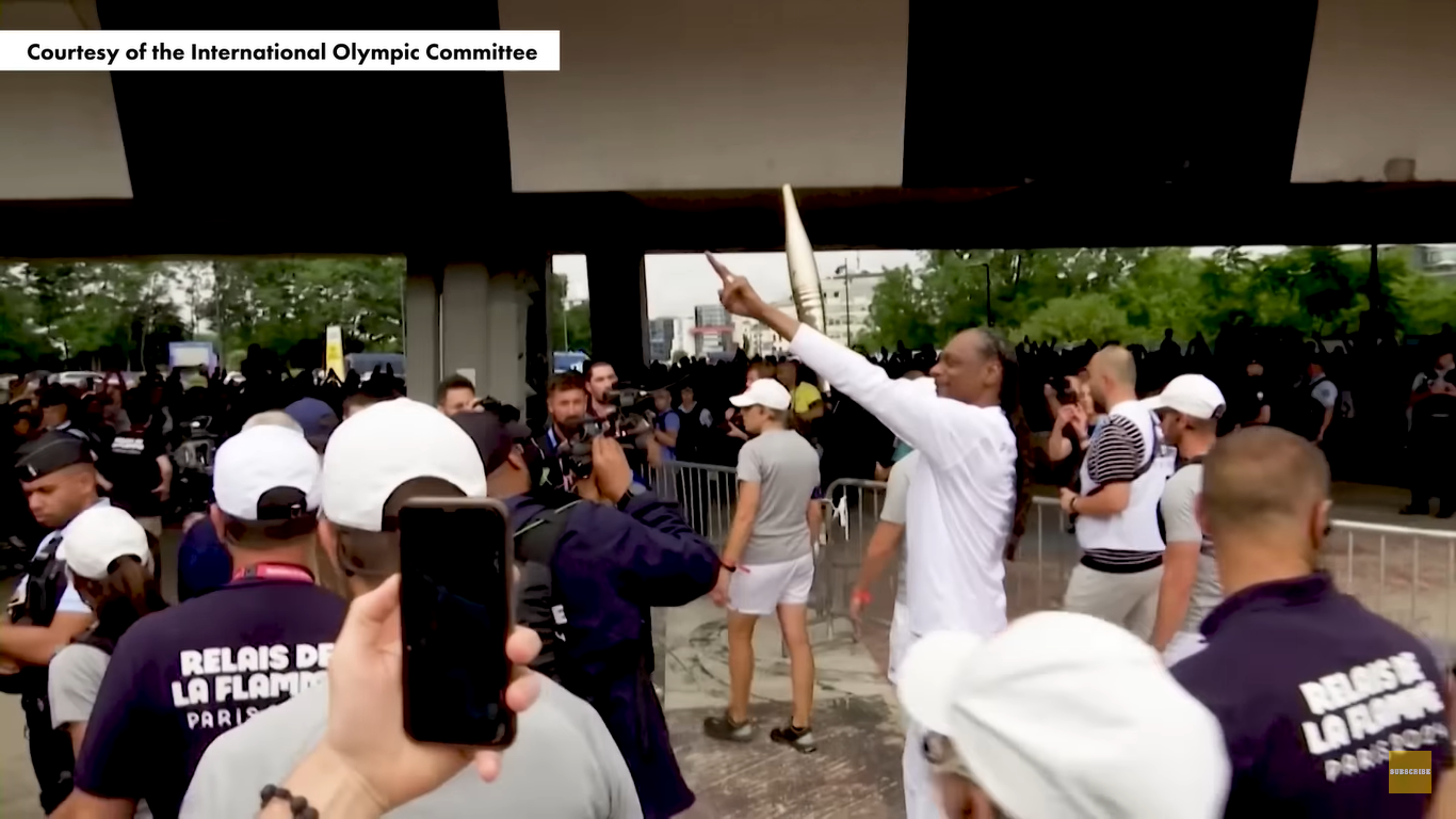 Snoop Dogg as a torch bearer for the 2024 Paris Olympics on July 26, 2024, in Paris, France. | Source: YouTube/PageSix