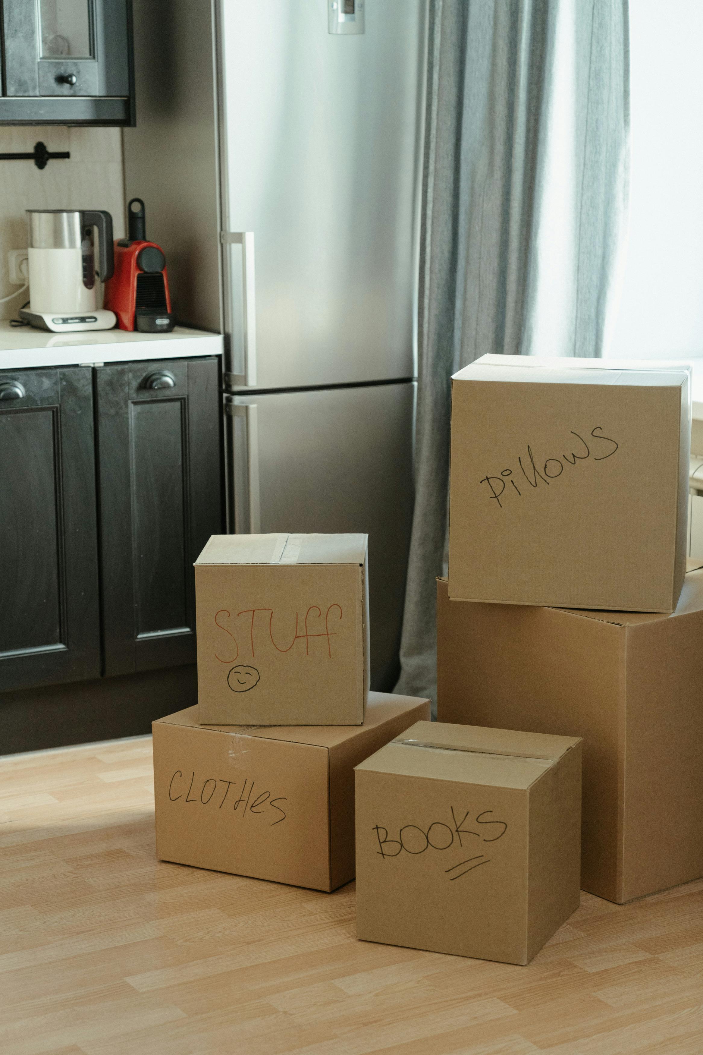 Moving boxes in a room | Source: Pexels