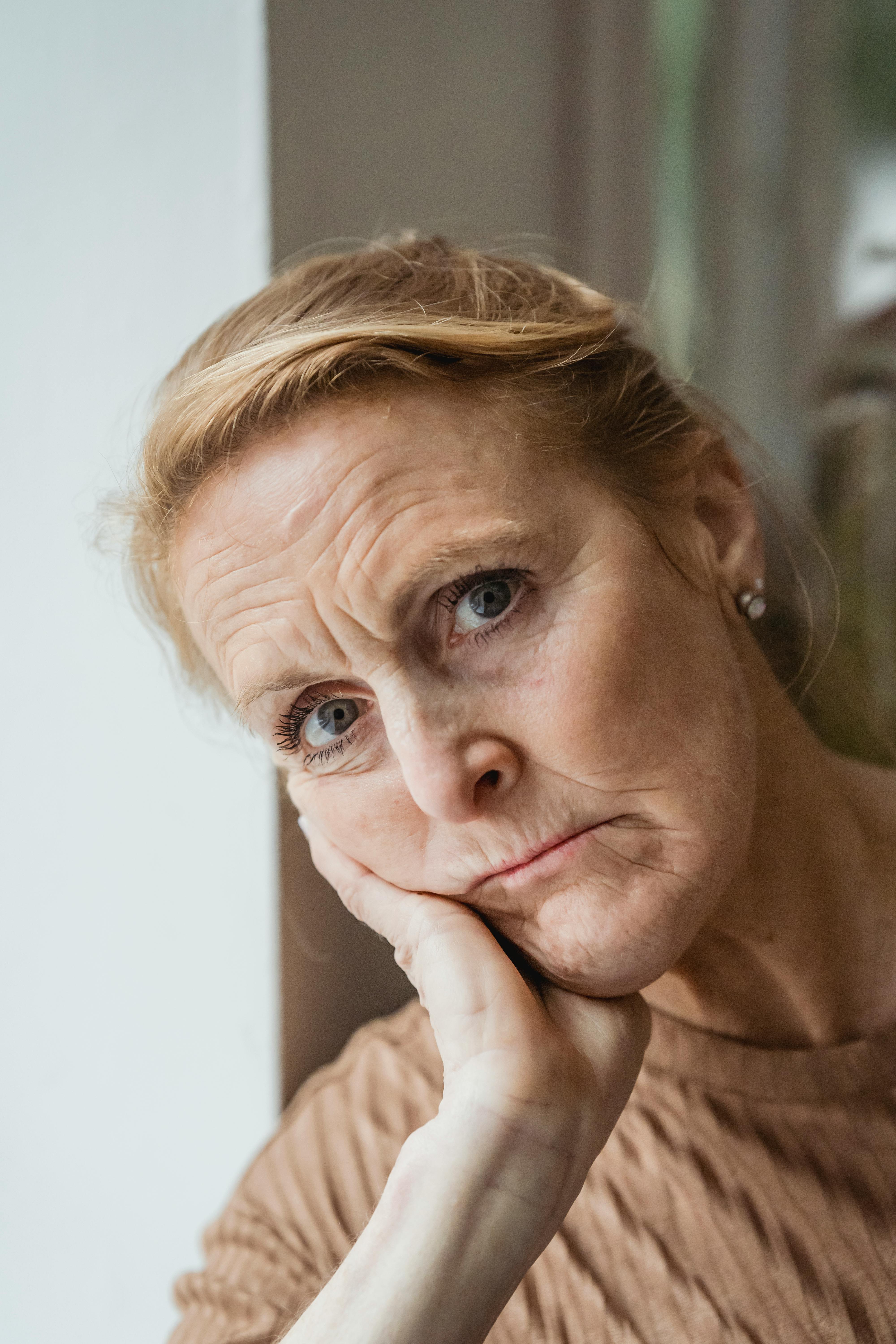 A shot of concerned woman looking at the camera | Source: Pexels