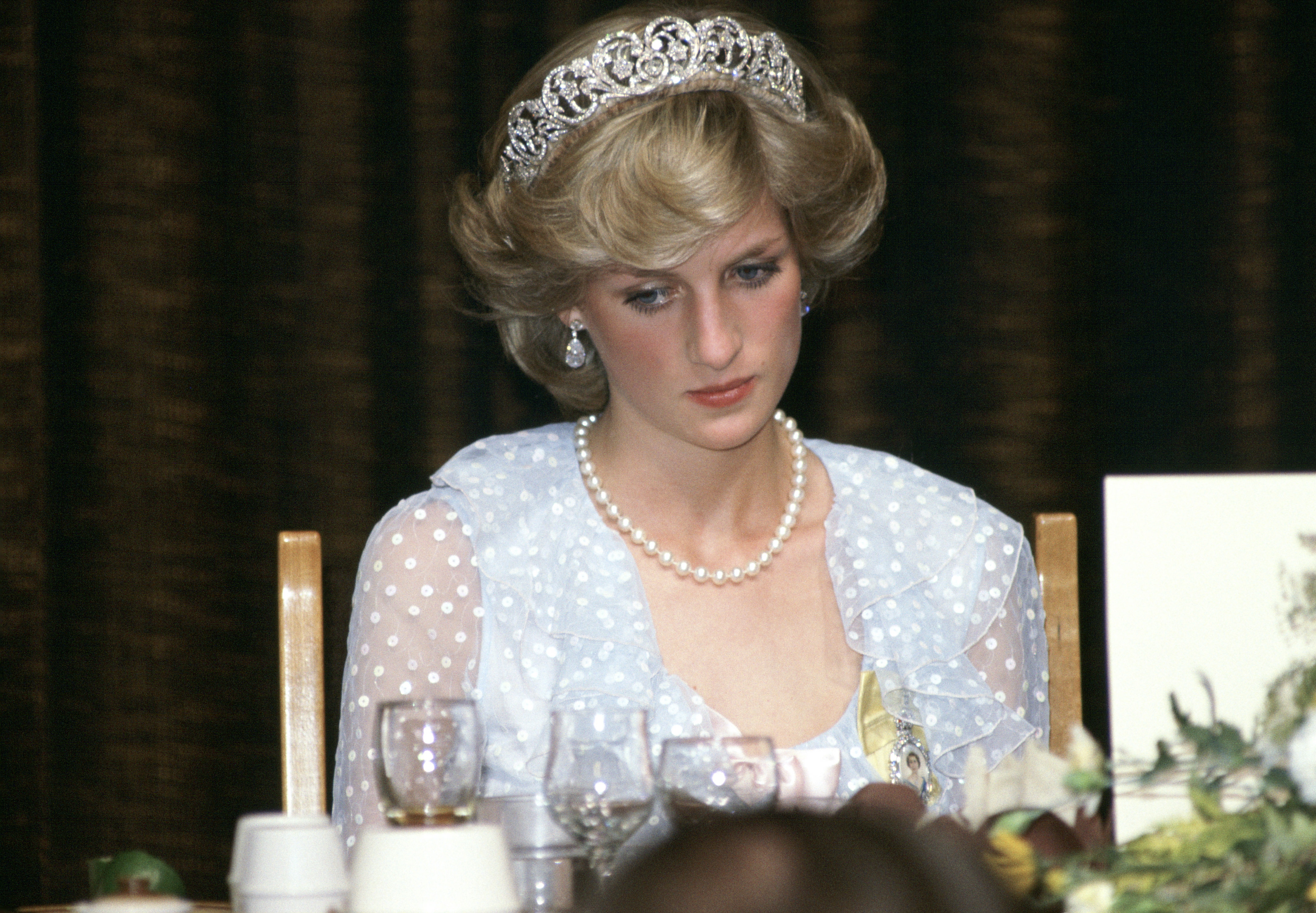 Princess Diana wore a blue chiffon evening dress designed by fashion designers David and Elizabeth Emanuel at a banquet in New Zealand on April 20, 1983. | Source: Getty Images