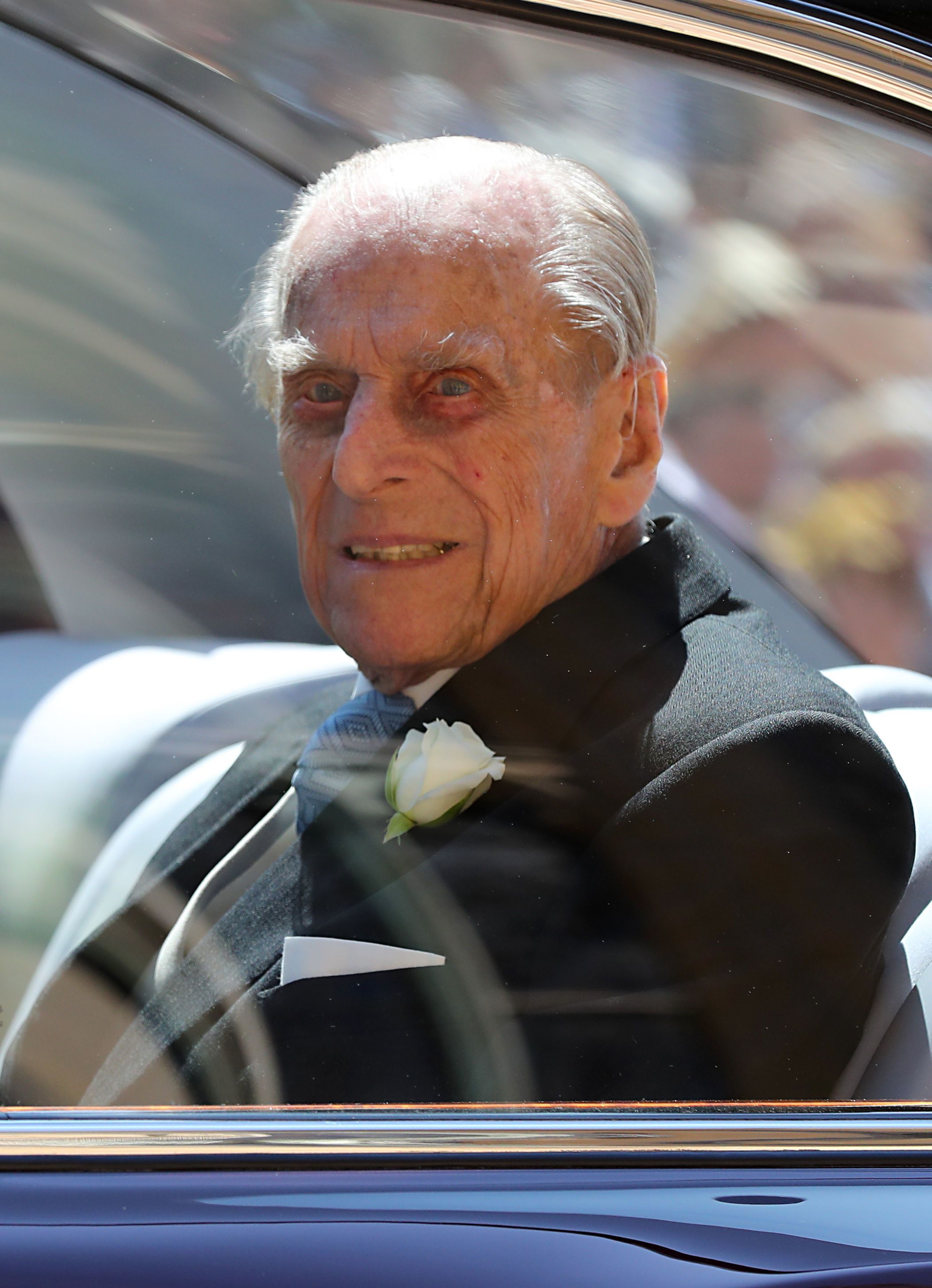 The late Prince Philip, Duke of Edinburgh, leaving St George's Chapel at Windsor Castle after the wedding of Prince Harry to Meghan Markle in Windsor, England | Photo: Gareth Fuller - WPA Pool/Getty Images