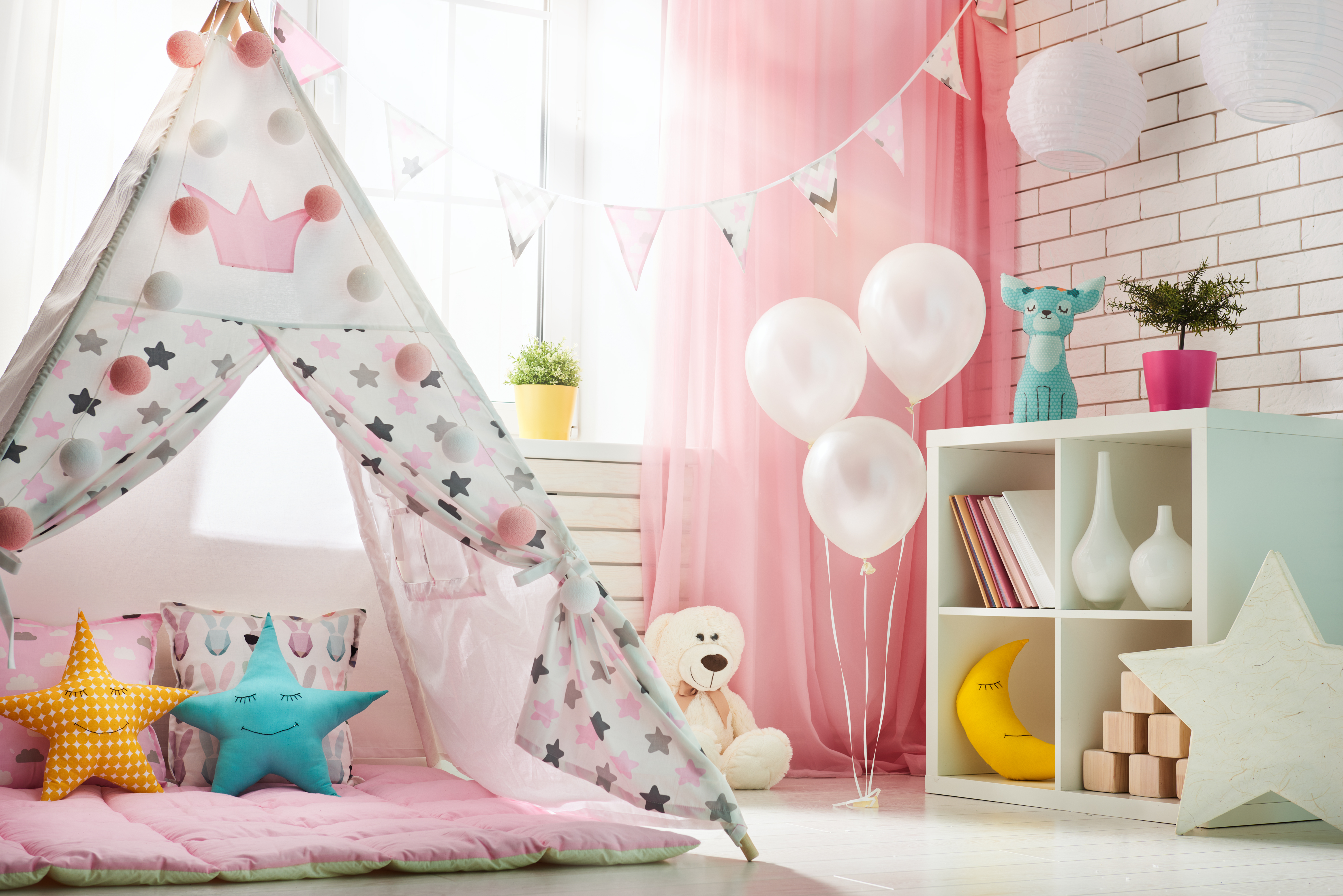 Spacious children room with play tent for girl | Source: Shutterstock