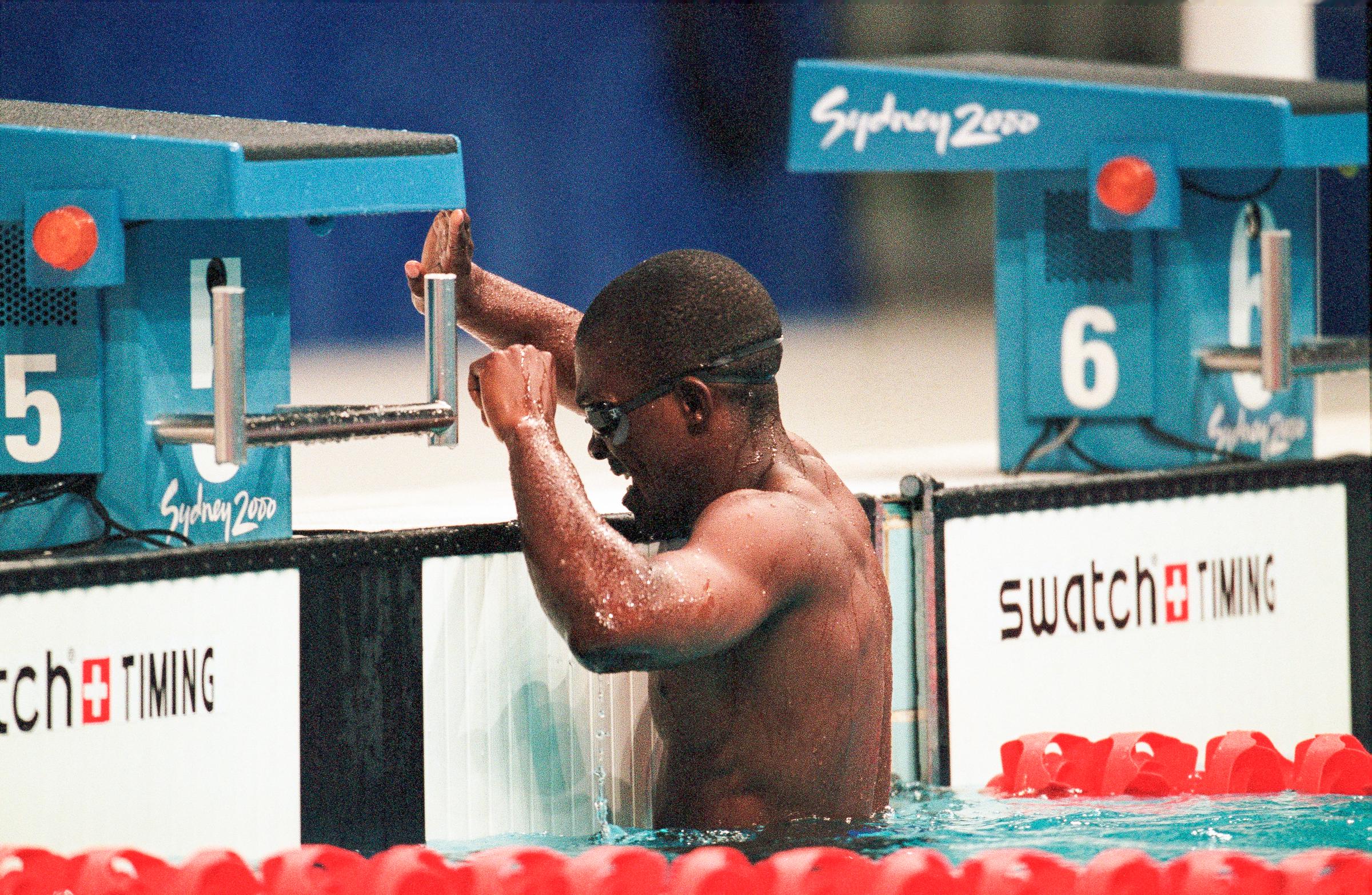 Eric Moussambani swims alone in the Men's 100m Freestyle Heat at the Sydney 2000 Olympic Games, on September 19, 2000, in Sydney, Australia | Source: Getty Images