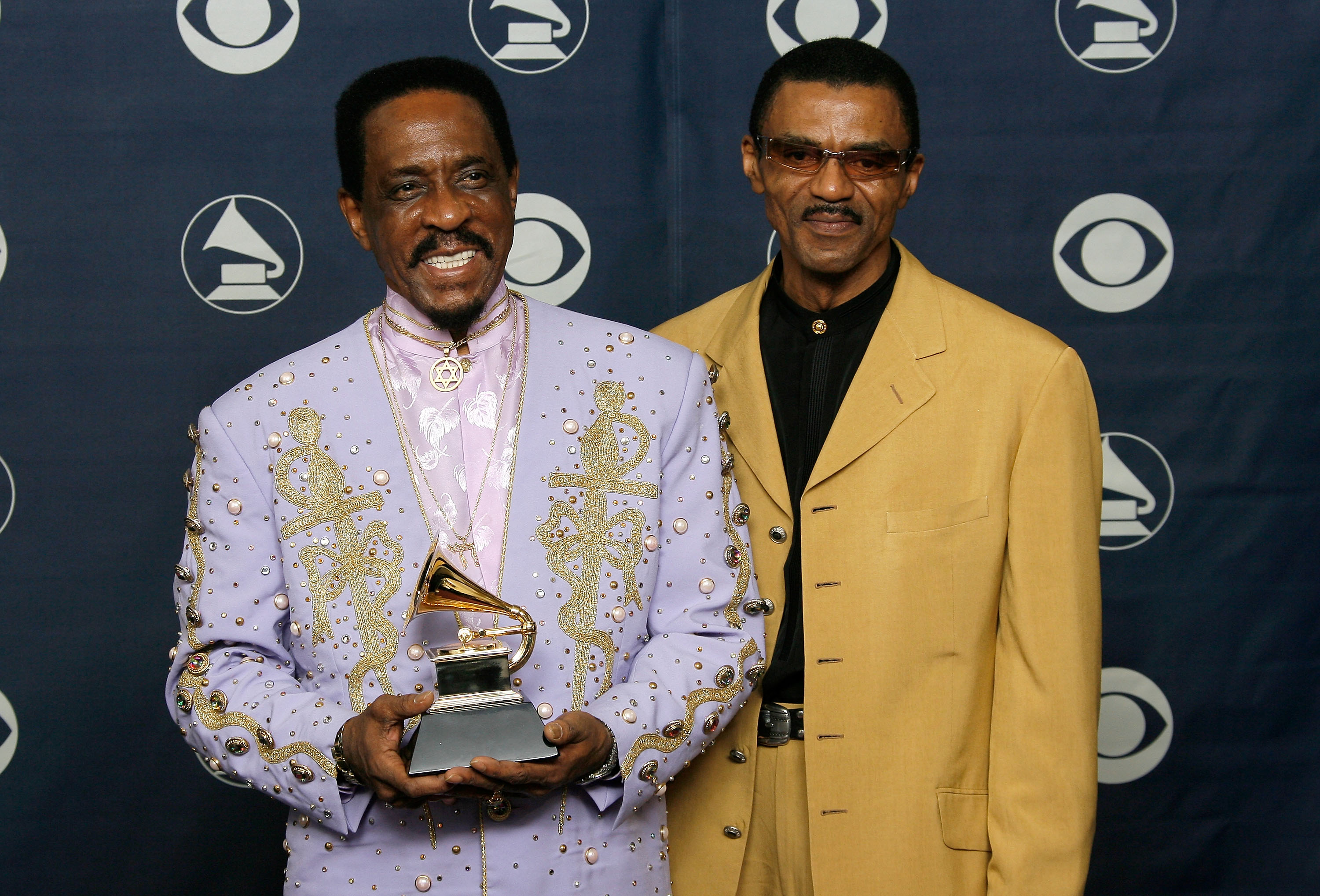 Ike Turner (L) and Ike Turner Jr. (R) pose with his Grammy for Best Traditional Blues Album for "Risin' With The Blues" in the press room at the 49th Annual Grammy Awards at the Staples Center on February 11, 2007 in Los Angeles, California. | Source: Getty Images